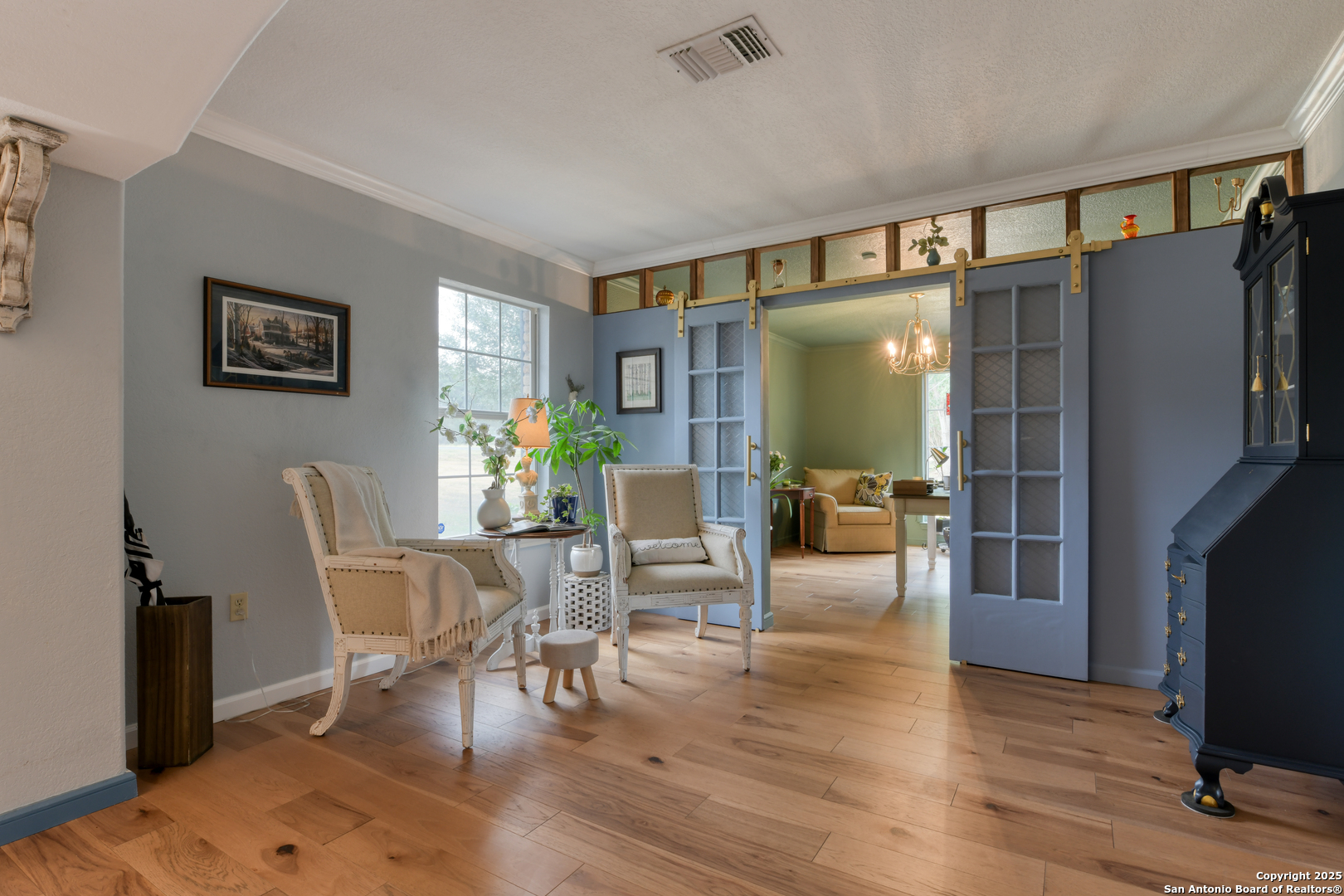 510 Rudeloff Road Seguin, TX 78155 - Photo 7 of 54 a living room with furniture and a flat screen tv