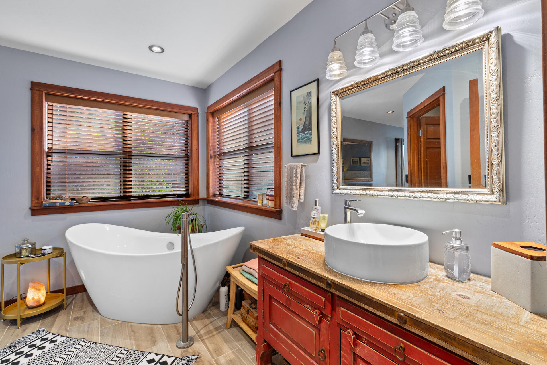15 South Garfield Street Rico, CO 81332 - Photo 16 of 43 a spacious bathroom with a granite countertop tub and a sink