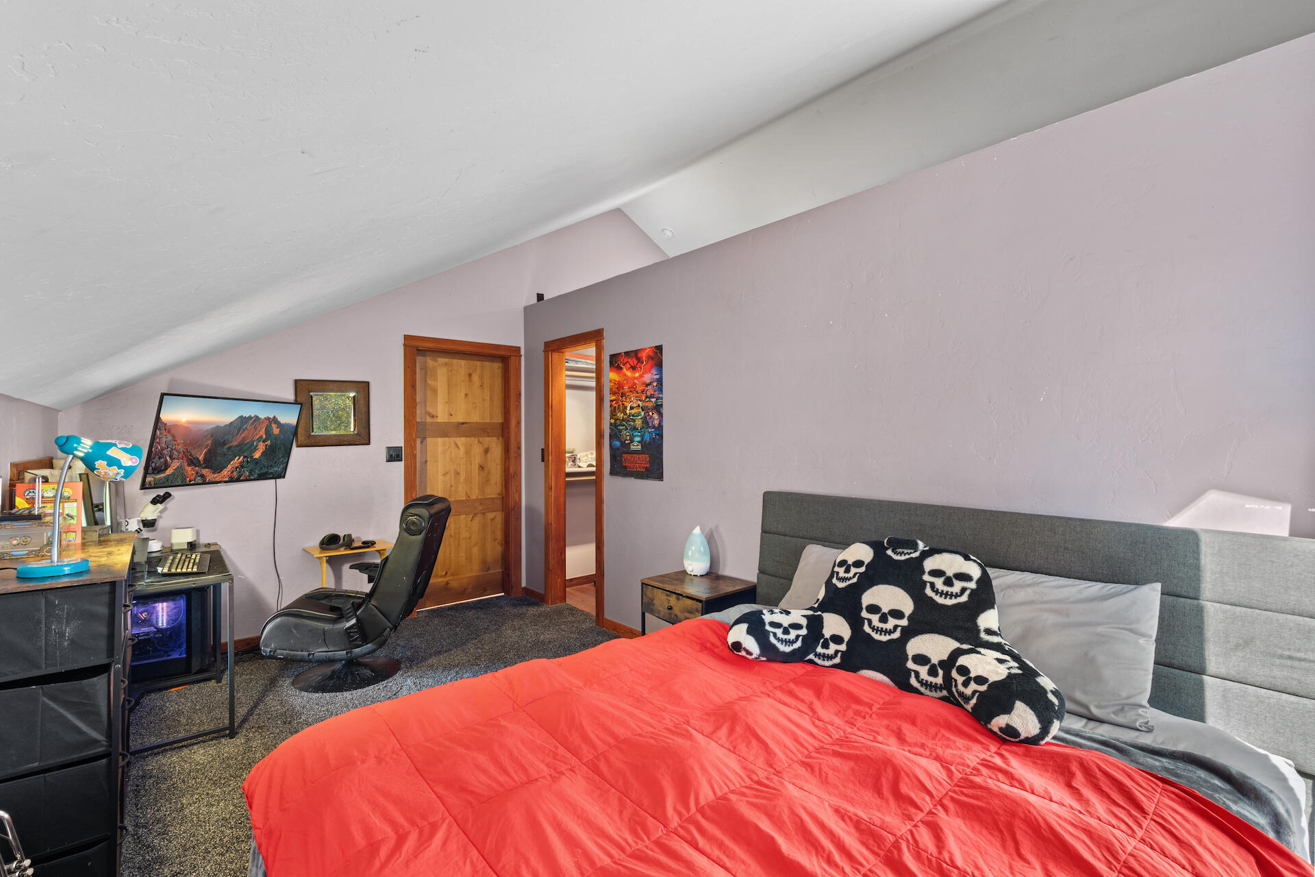 15 South Garfield Street Rico, CO 81332 - Photo 23 of 43 a bedroom with a bed and wooden floor