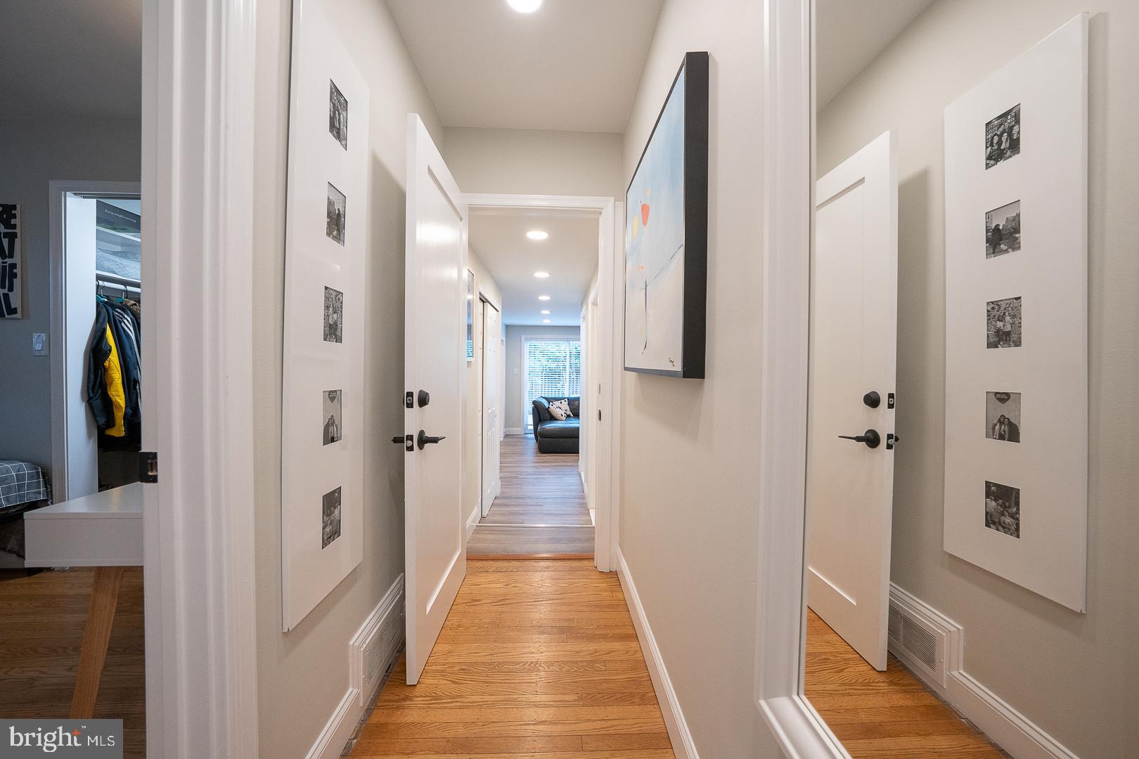 1022 Clover Hill Road Wynnewood, PA 19096 - Photo 21 of 40 a view of a hallway with wooden floor and staircase