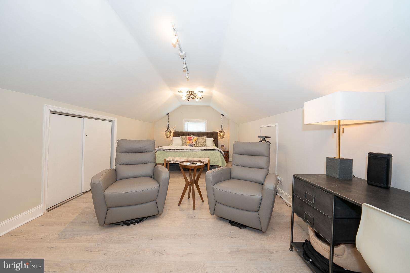 1022 Clover Hill Road Wynnewood, PA 19096 - Photo 30 of 40 a living room with furniture and a lamp