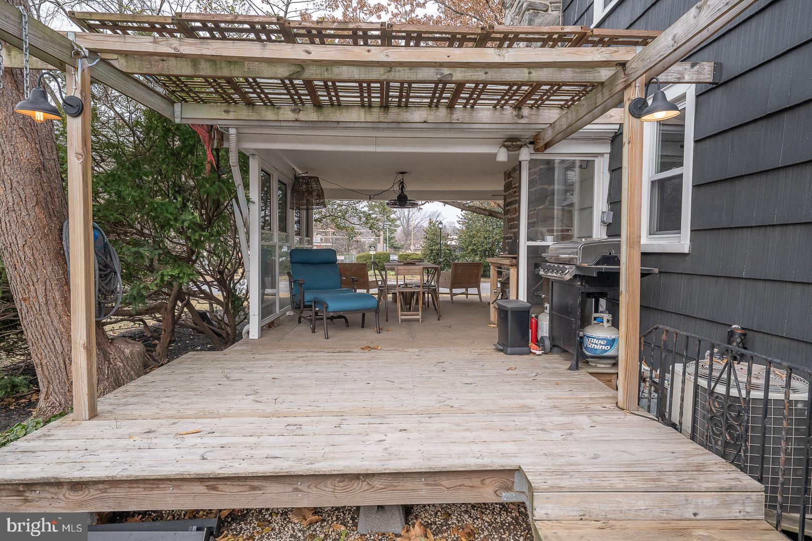 1022 Clover Hill Road Wynnewood, PA 19096 - Photo 38 of 40 a view of a chairs and table in a patio