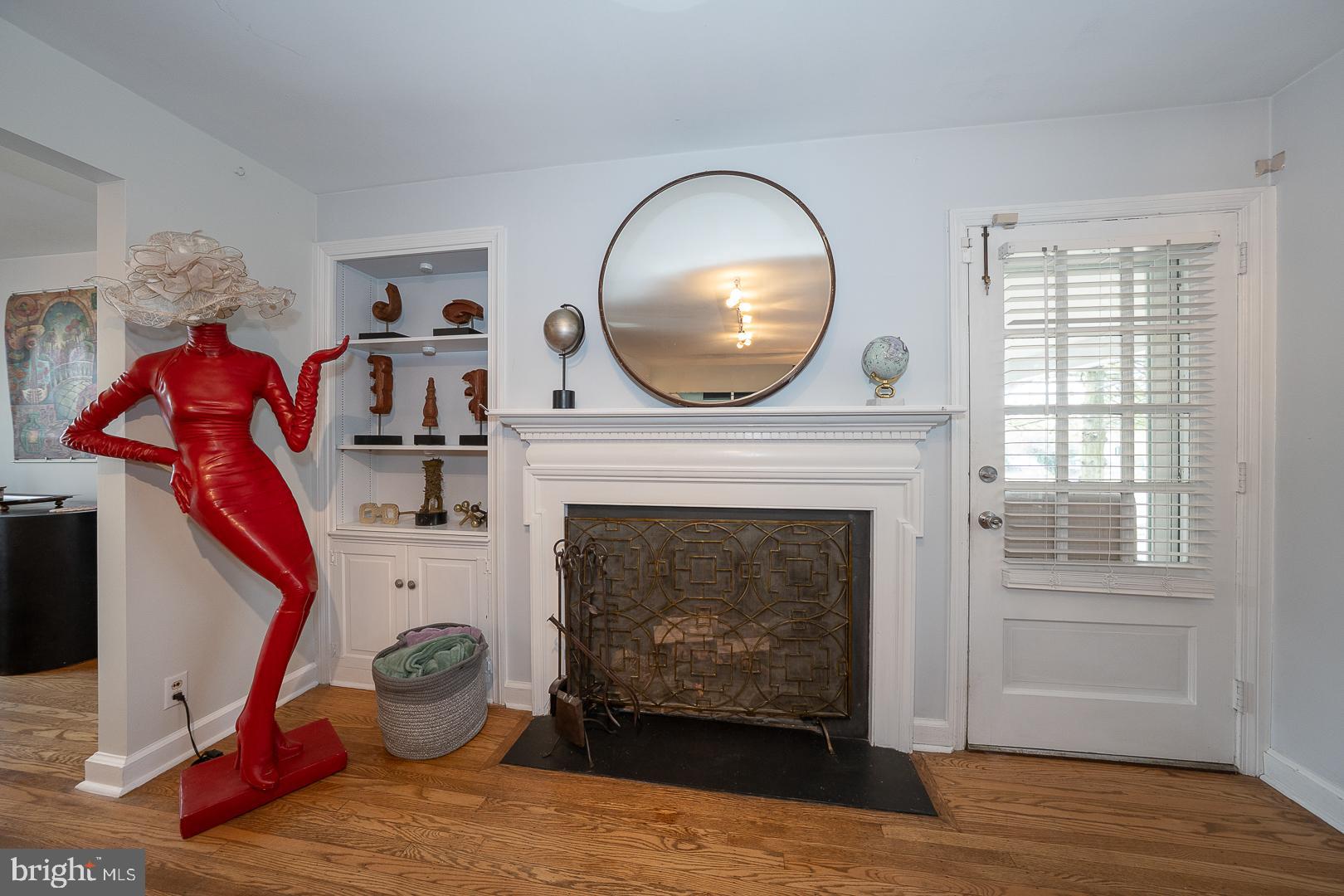 1022 Clover Hill Road Wynnewood, PA 19096 - Photo 5 of 40 a living room with furniture and a fireplace