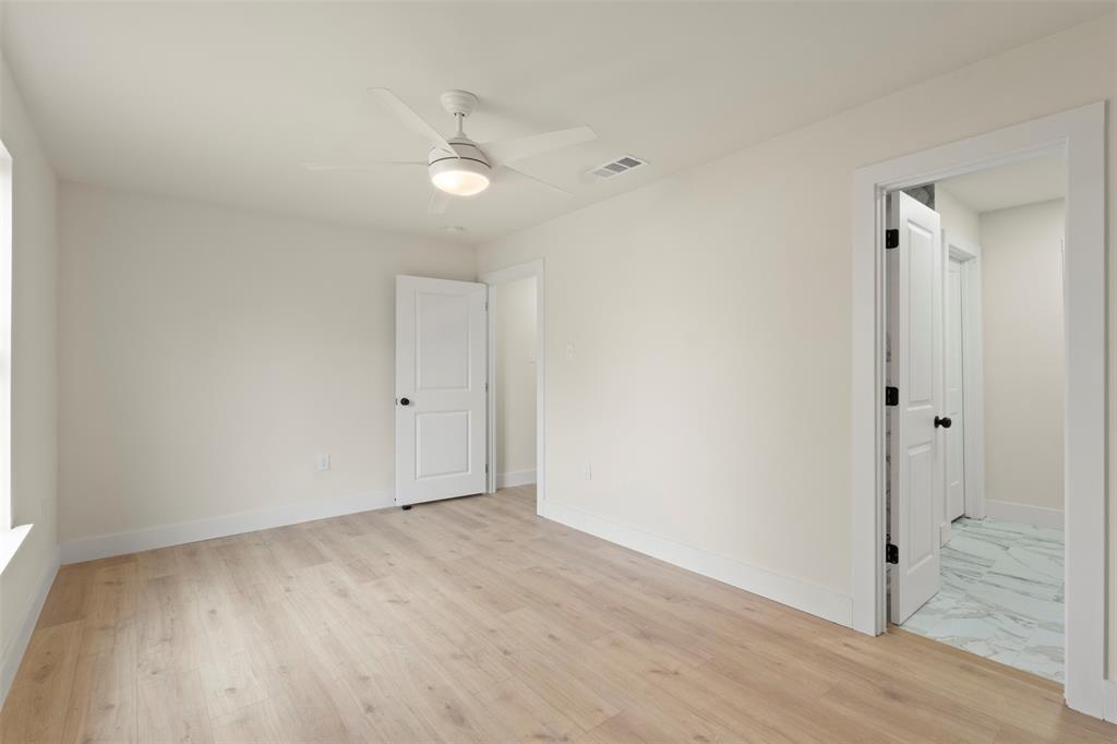 5124 Kilpatrick Avenue Fort Worth, TX 76107 - Photo 13 of 31 wooden floor in an empty room