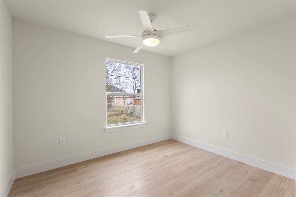 5124 Kilpatrick Avenue Fort Worth, TX 76107 - Photo 19 of 31 an empty room with a window