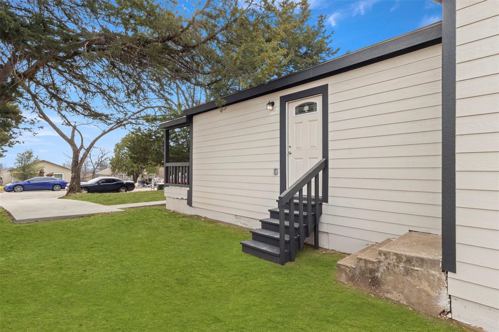 5124 Kilpatrick Avenue Fort Worth, TX 76107 - Photo 25 of 31 a view of a house with a yard