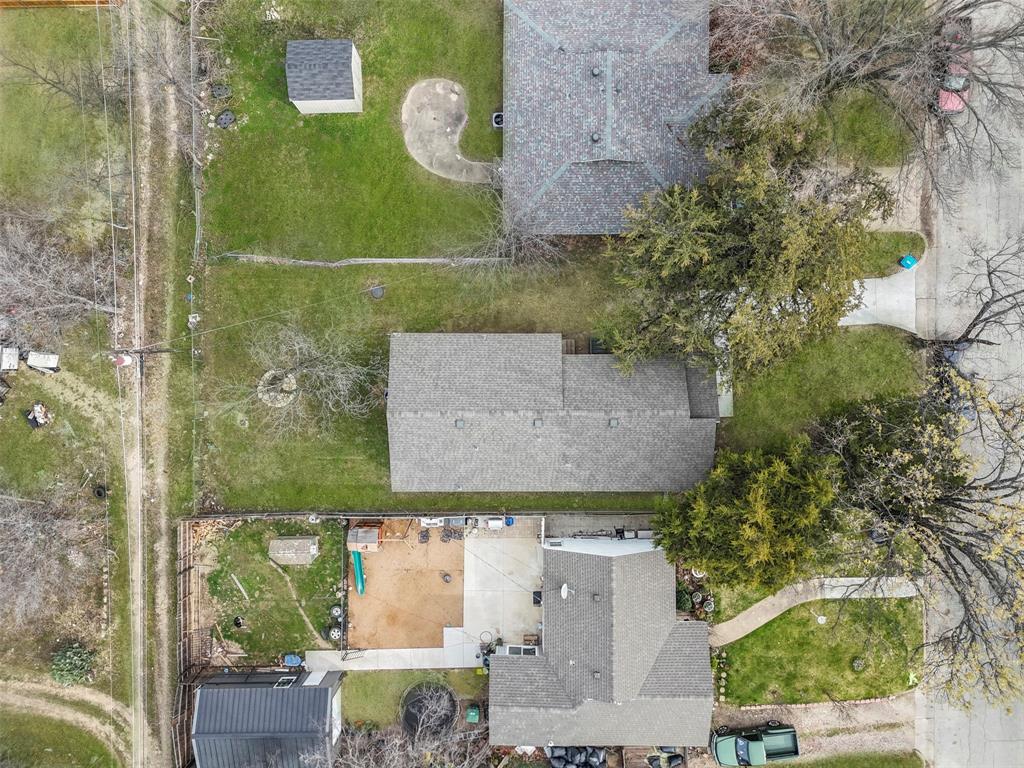 5124 Kilpatrick Avenue Fort Worth, TX 76107 - Photo 26 of 31 an aerial view of a house with a yard