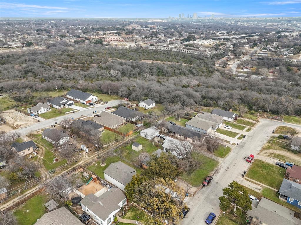 5124 Kilpatrick Avenue Fort Worth, TX 76107 - Photo 28 of 31 an aerial view of residential houses with outdoor space