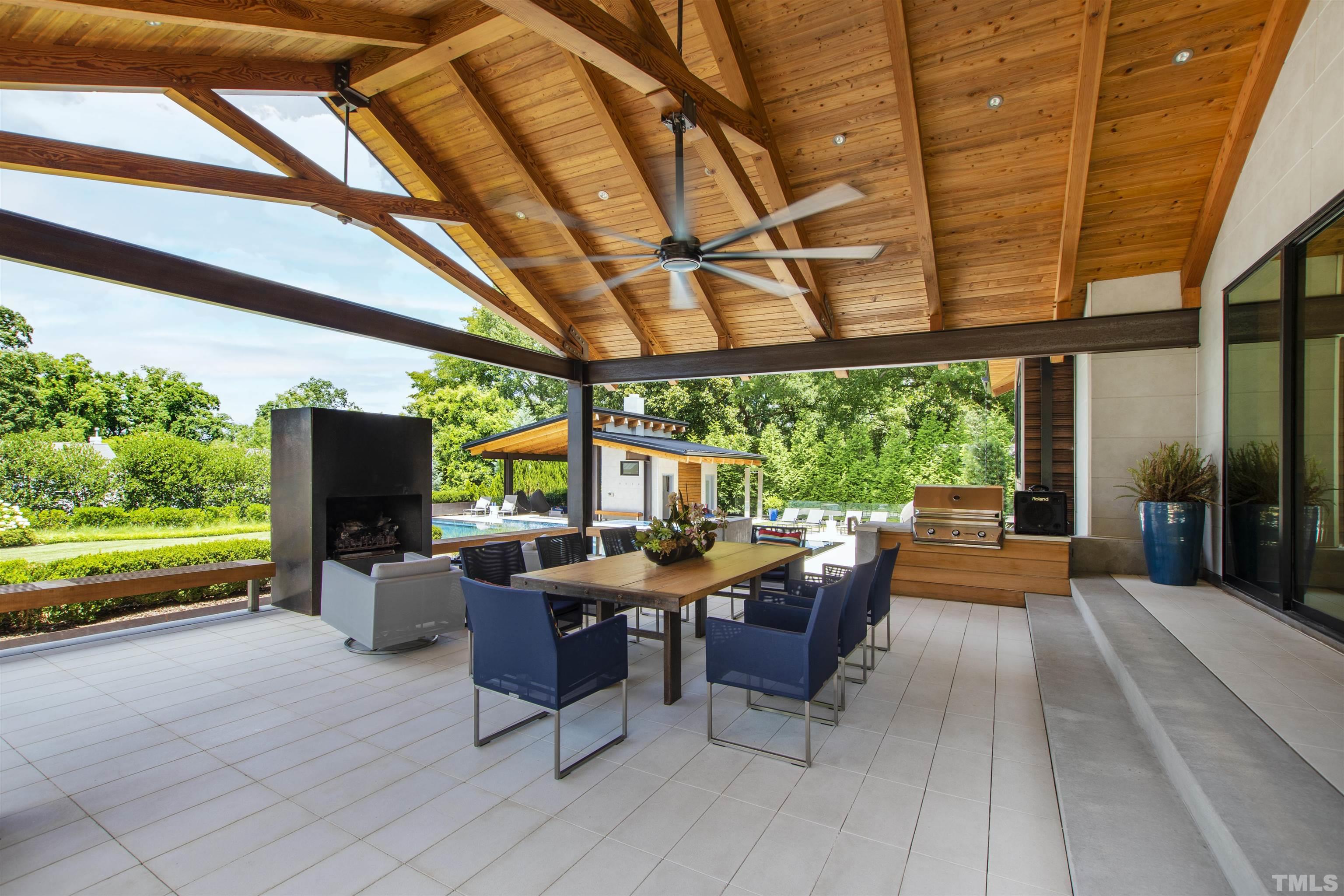 2315 Beechridge Road Raleigh, NC 27608 - Photo 47 of 78 a patio with patio lots of furniture and garden