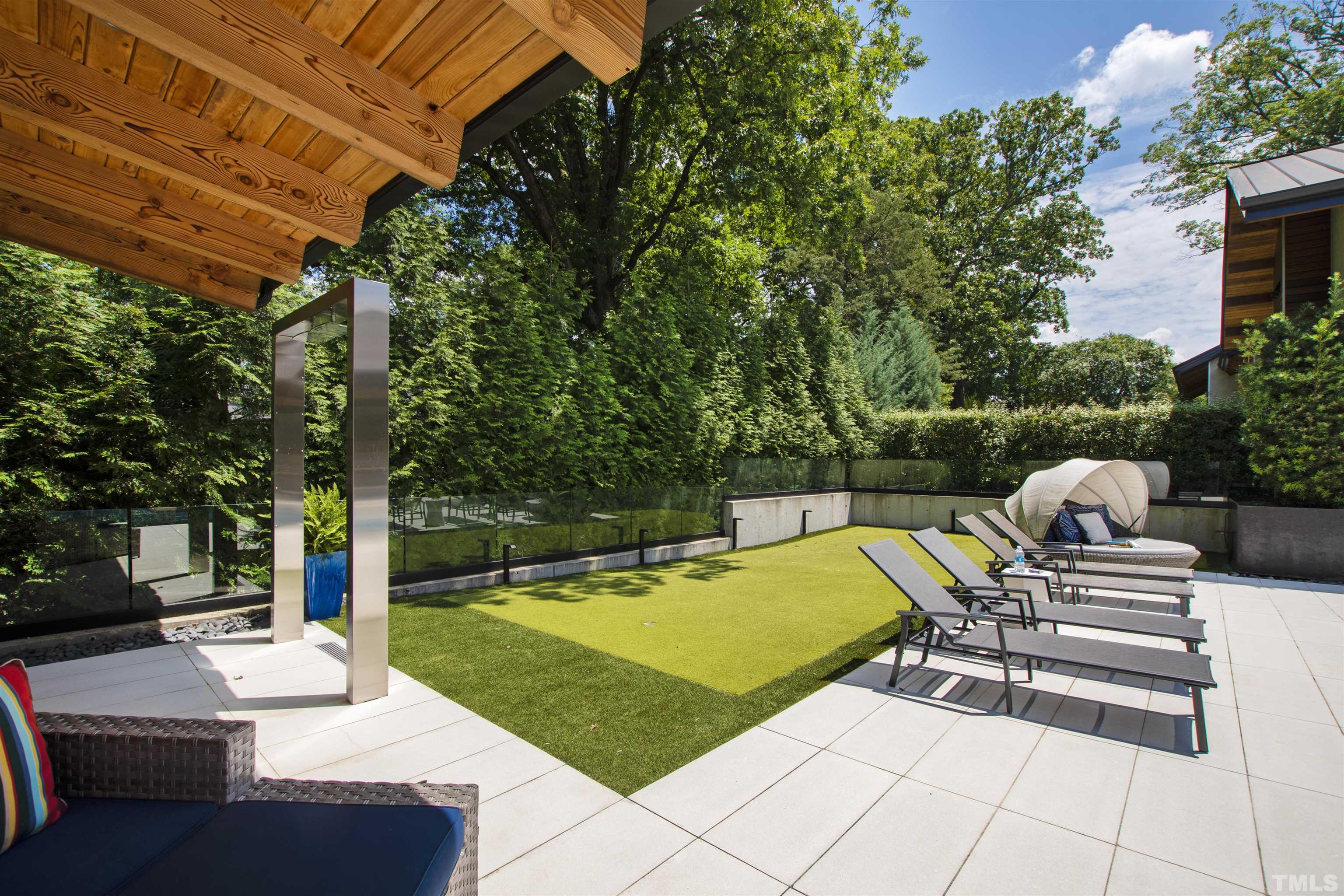2315 Beechridge Road Raleigh, NC 27608 - Photo 55 of 78 a view of a patio with swimming pool