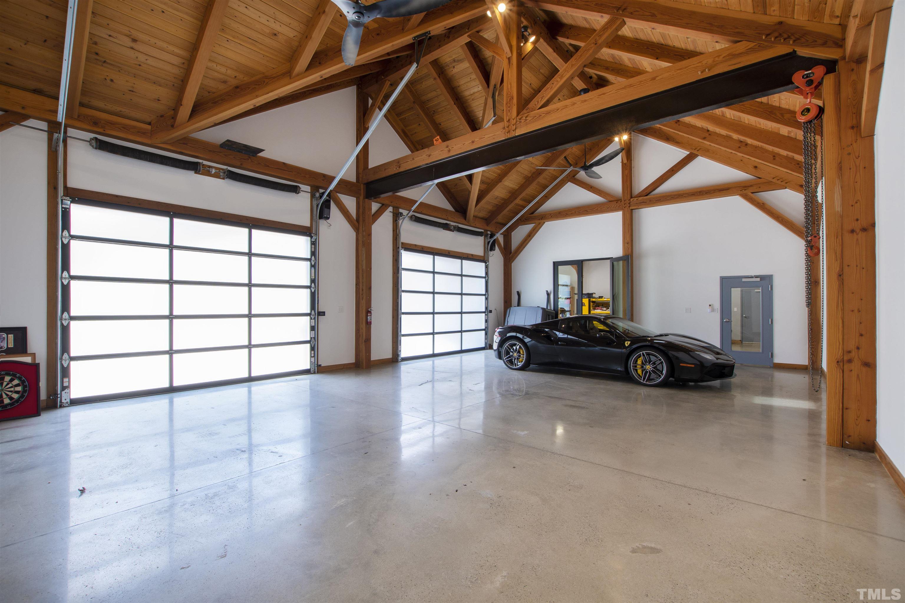 2315 Beechridge Road Raleigh, NC 27608 - Photo 62 of 78 a view of a livingroom with furniture and a garage