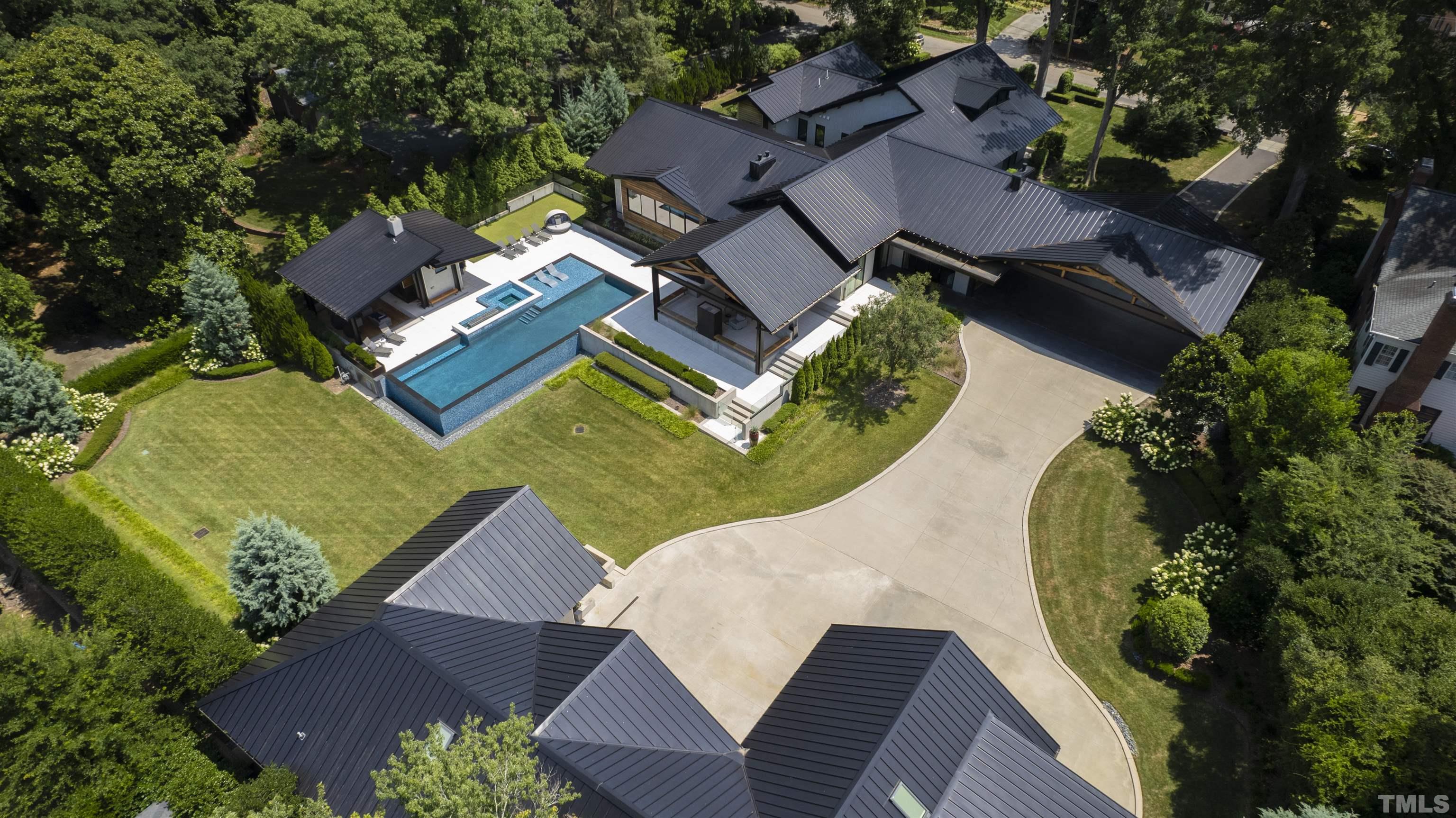 2315 Beechridge Road Raleigh, NC 27608 - Photo 65 of 78 an aerial view of a house with a yard
