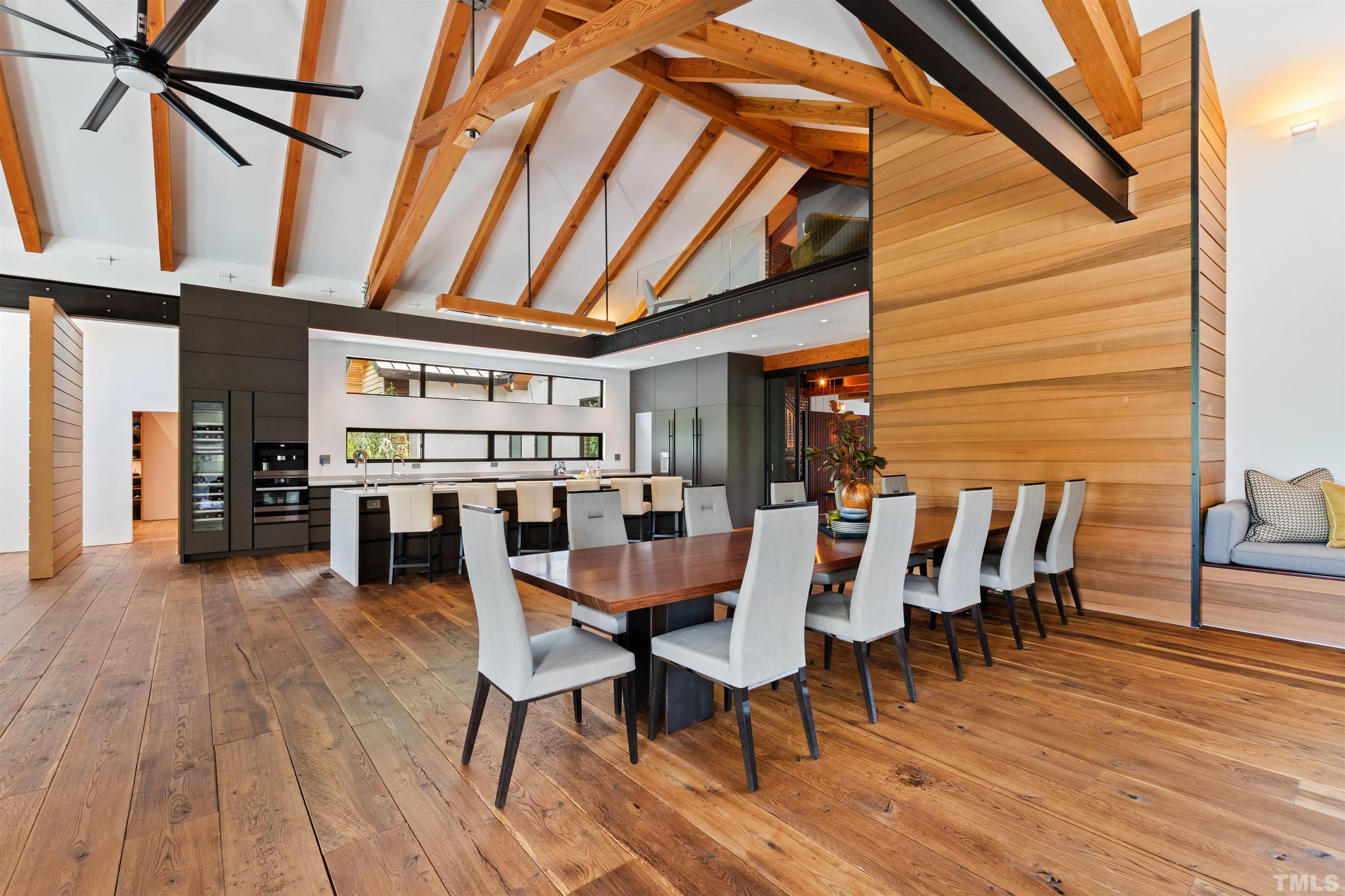 2315 Beechridge Road Raleigh, NC 27608 - Photo 7 of 78 a view of a dining room with furniture and wooden floor