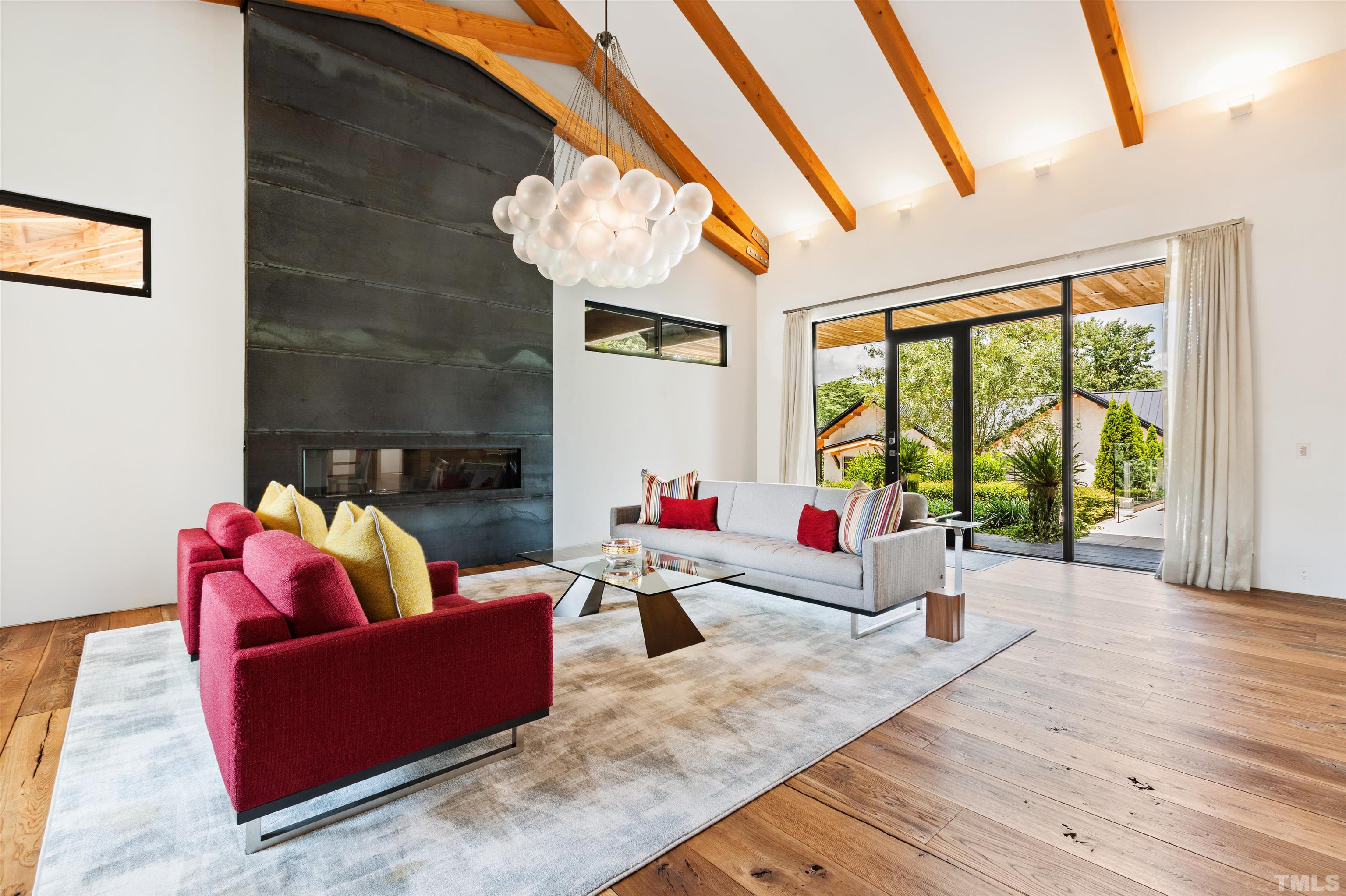 2315 Beechridge Road Raleigh, NC 27608 - Photo 9 of 78 a living room with furniture and a large window