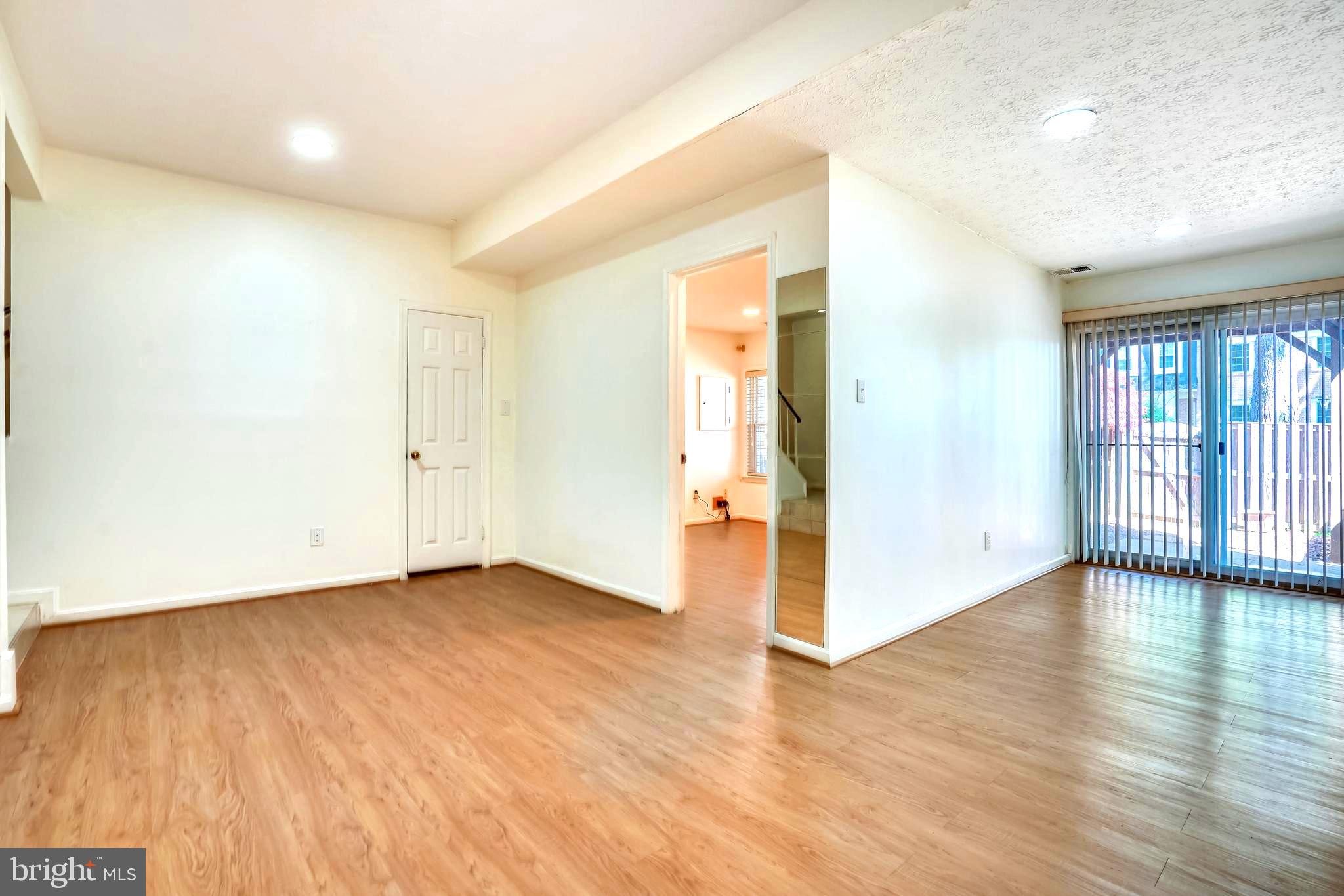 3151 Borge Street Oakton, VA 22124 - Photo 39 of 46 Basement recreation room & walk out to back yard