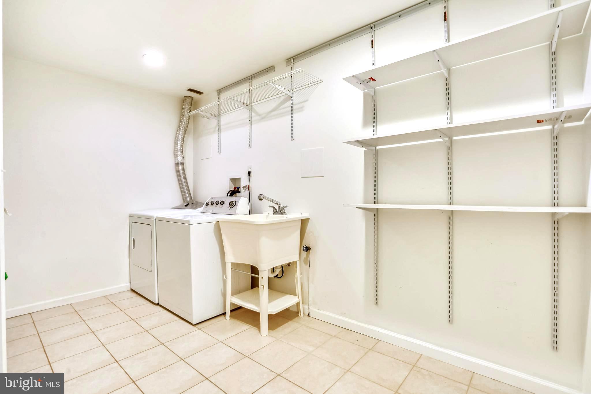 3151 Borge Street Oakton, VA 22124 - Photo 41 of 46 Laundry with storage space