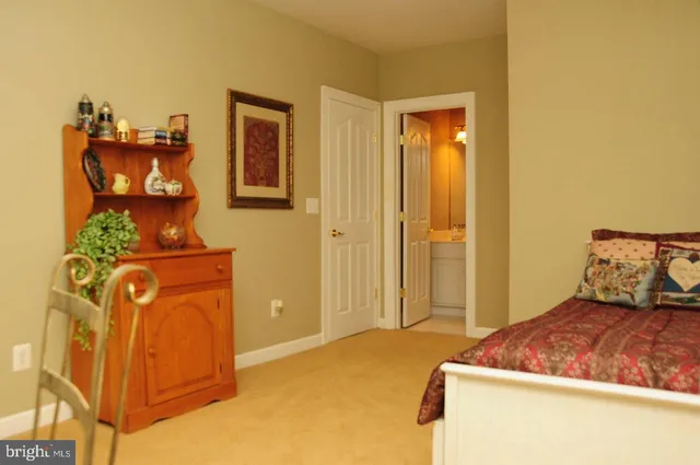 a room with furniture pool table and windows