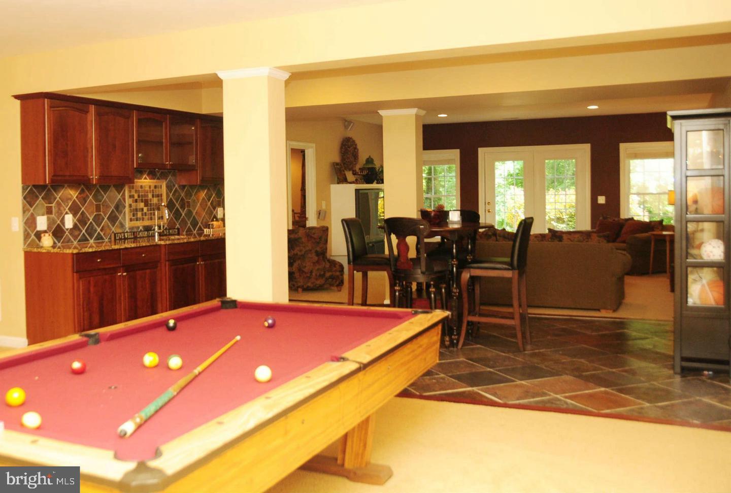 19123 Stream Crossing Court Leesburg, VA 20176 - Photo 17 of 30 a room with furniture pool table and windows