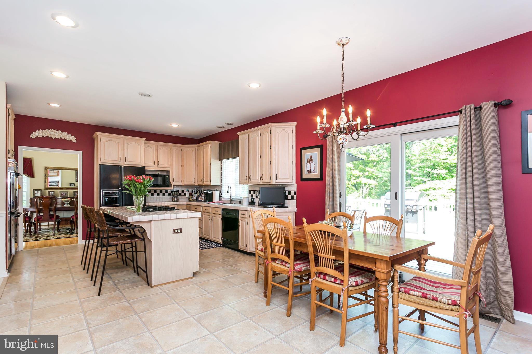 14205 Robcaste Road Phoenix, MD 21131 - Photo 3 of 30 Open Bright Kitchen With Easy Access To Deck