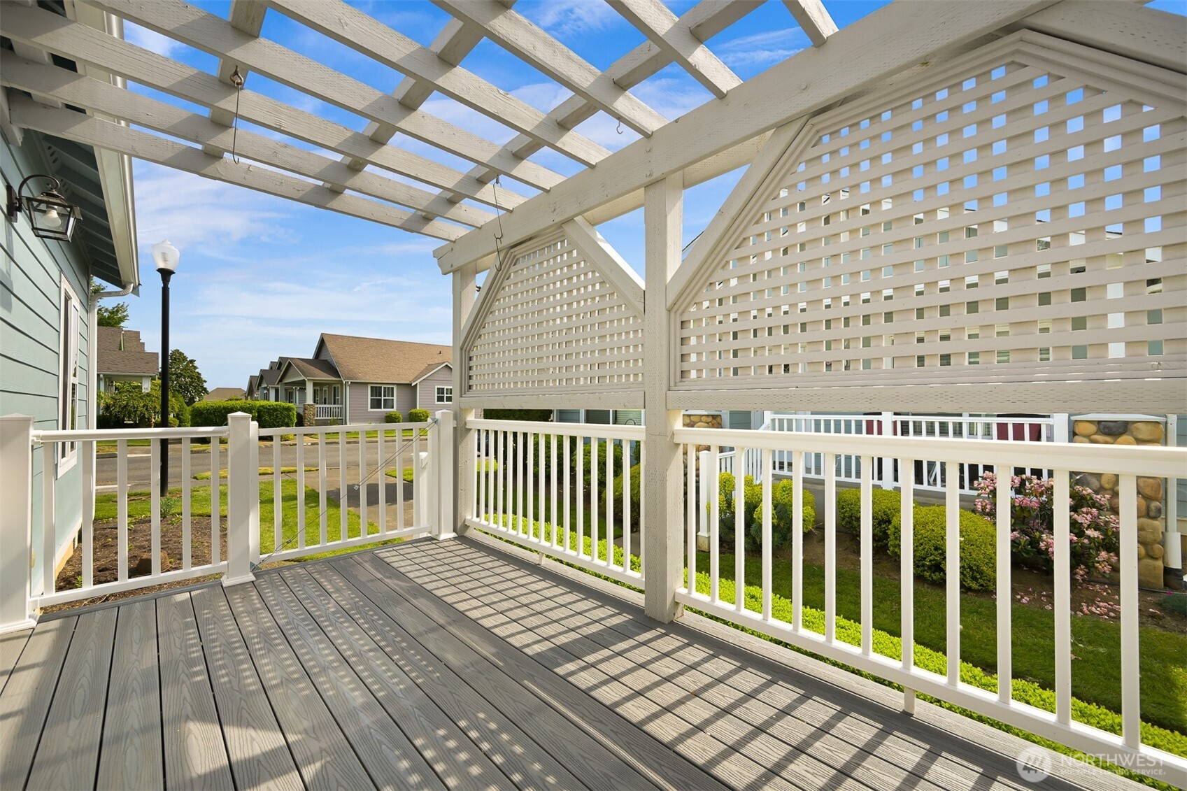 500 Fieldstone Loop, Unit 14 Lynden, WA 98264 - Photo 22 of 25 a balcony with wooden floor