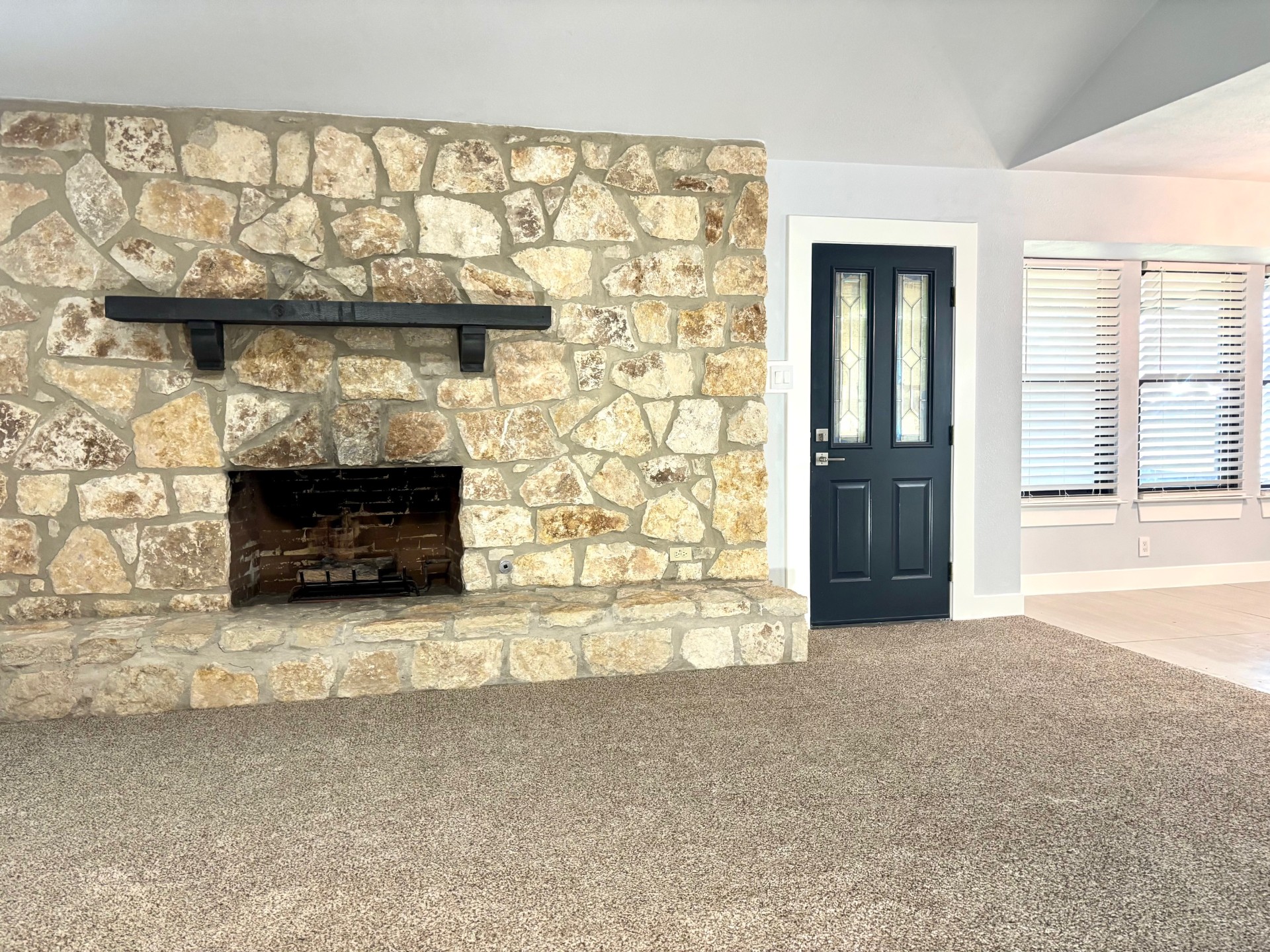 3416 Primrose Trail Georgetown, TX 78628 - Photo 17 of 35 15 x 22' living room featuring carpet floors and vaulted ceiling