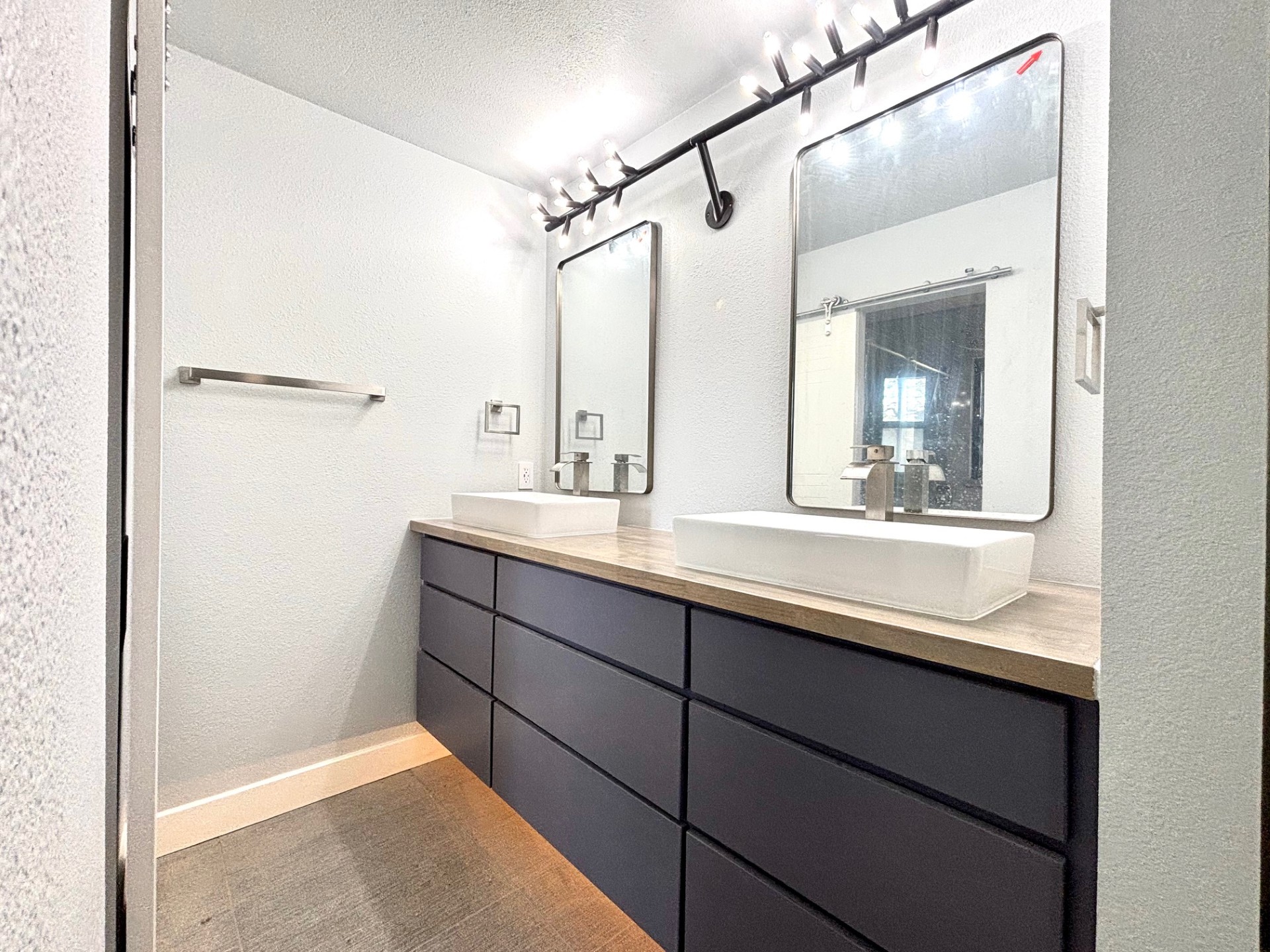 3416 Primrose Trail Georgetown, TX 78628 - Photo 26 of 35 a bathroom with a sink and a mirror