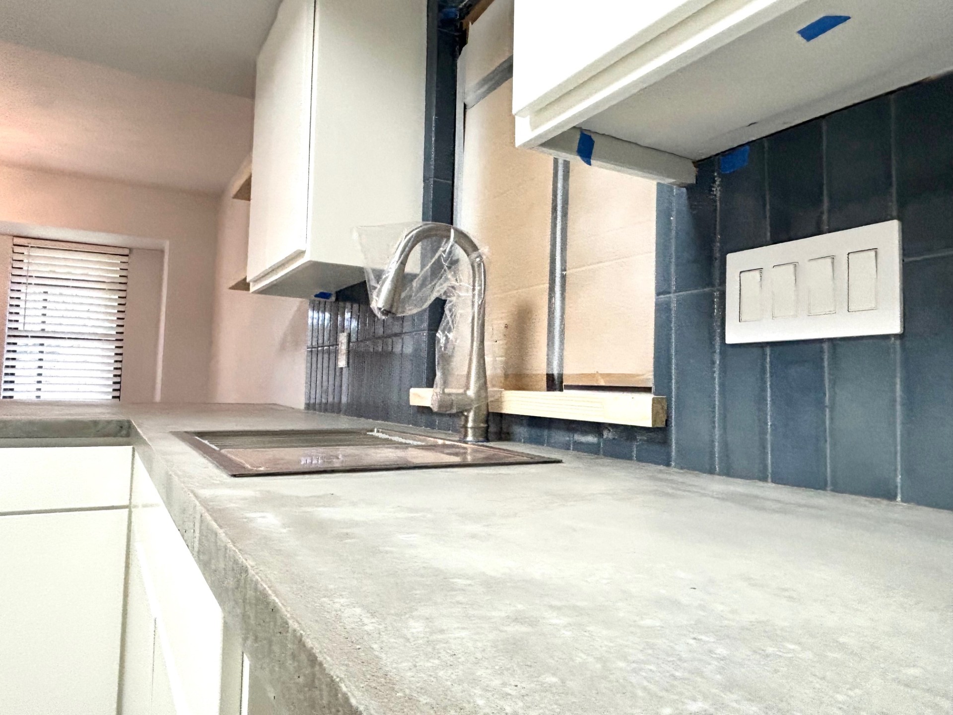 3416 Primrose Trail Georgetown, TX 78628 - Photo 10 of 35 a view of a kitchen with a sink and large window