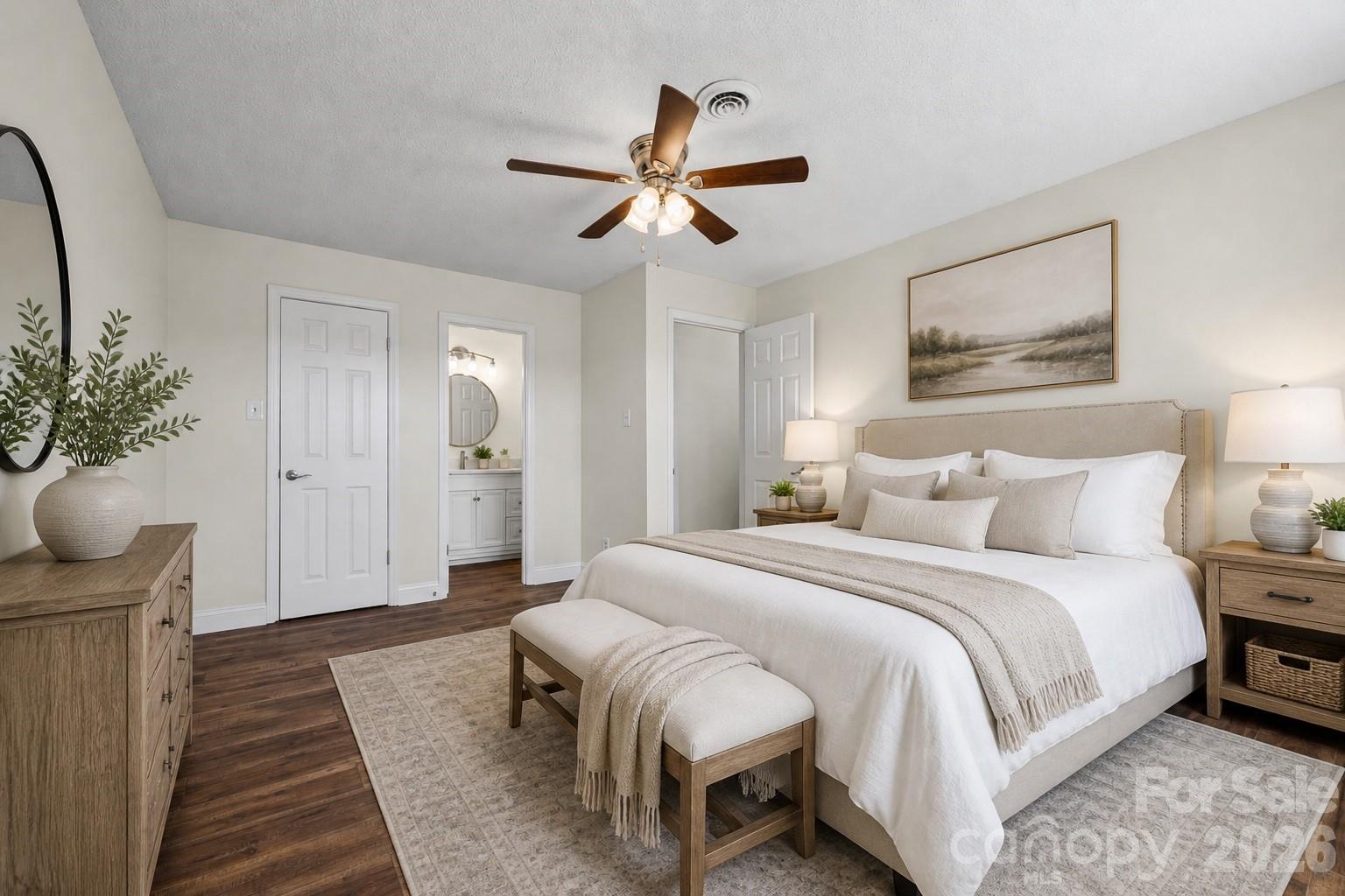 16149 Haroa Court Fort Mill, SC 29708 - Photo 43 of 43 a bedroom with bed and a chandelier