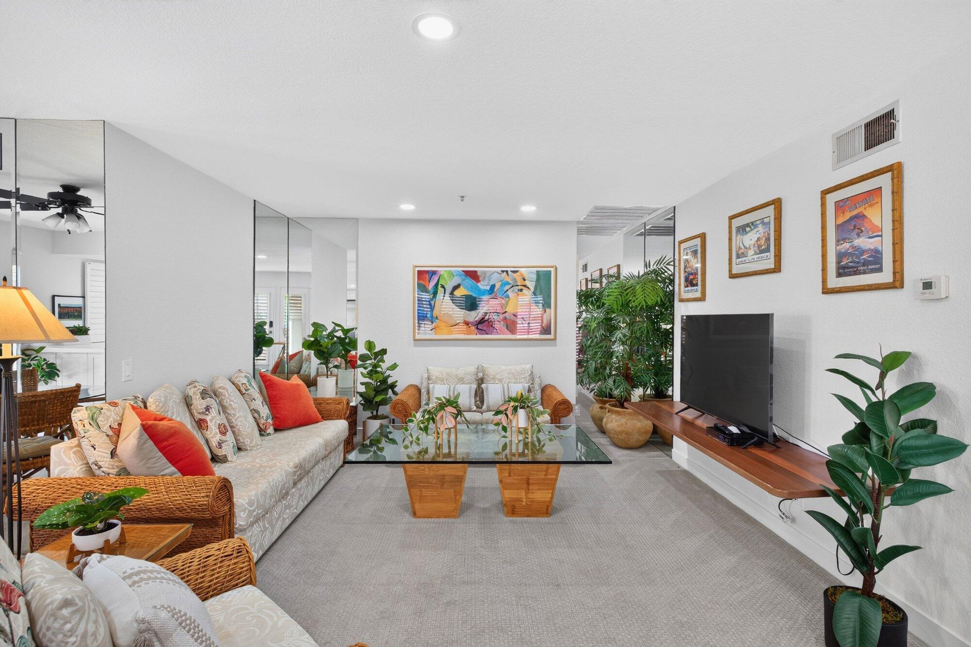 500 East Amado Road, Unit 313 Palm Springs, CA 92262 - Photo 8 of 32 a living room with furniture potted plant and a window