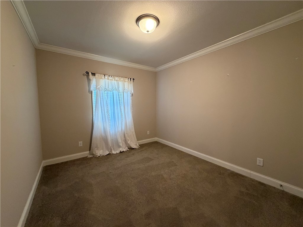 375 Trail Ridge Drive Sandia, TX 78383 - Photo 12 of 17 an empty room with a empty space and a window