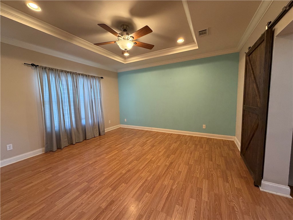 375 Trail Ridge Drive Sandia, TX 78383 - Photo 6 of 17 wooden floor in an empty room with a window