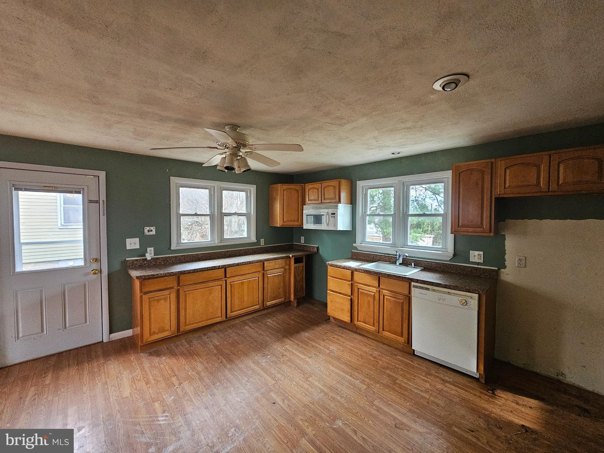 1261 Main Street Harrisburg, PA 17113 - Photo 2 of 10 a large kitchen with stainless steel appliances granite countertop a stove a sink dishwasher and a refrigerator