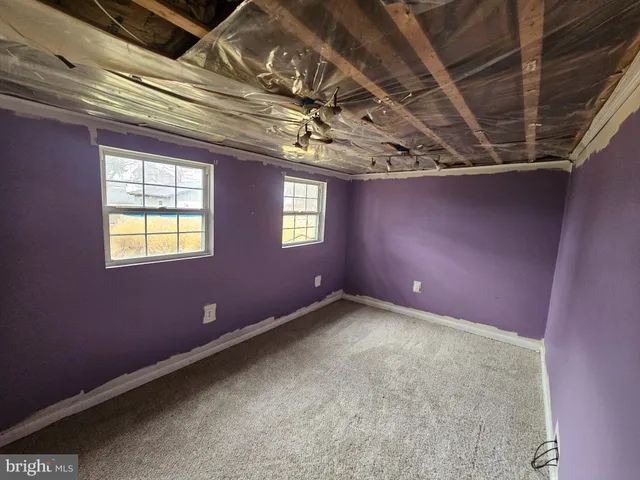 a view of a room with windows