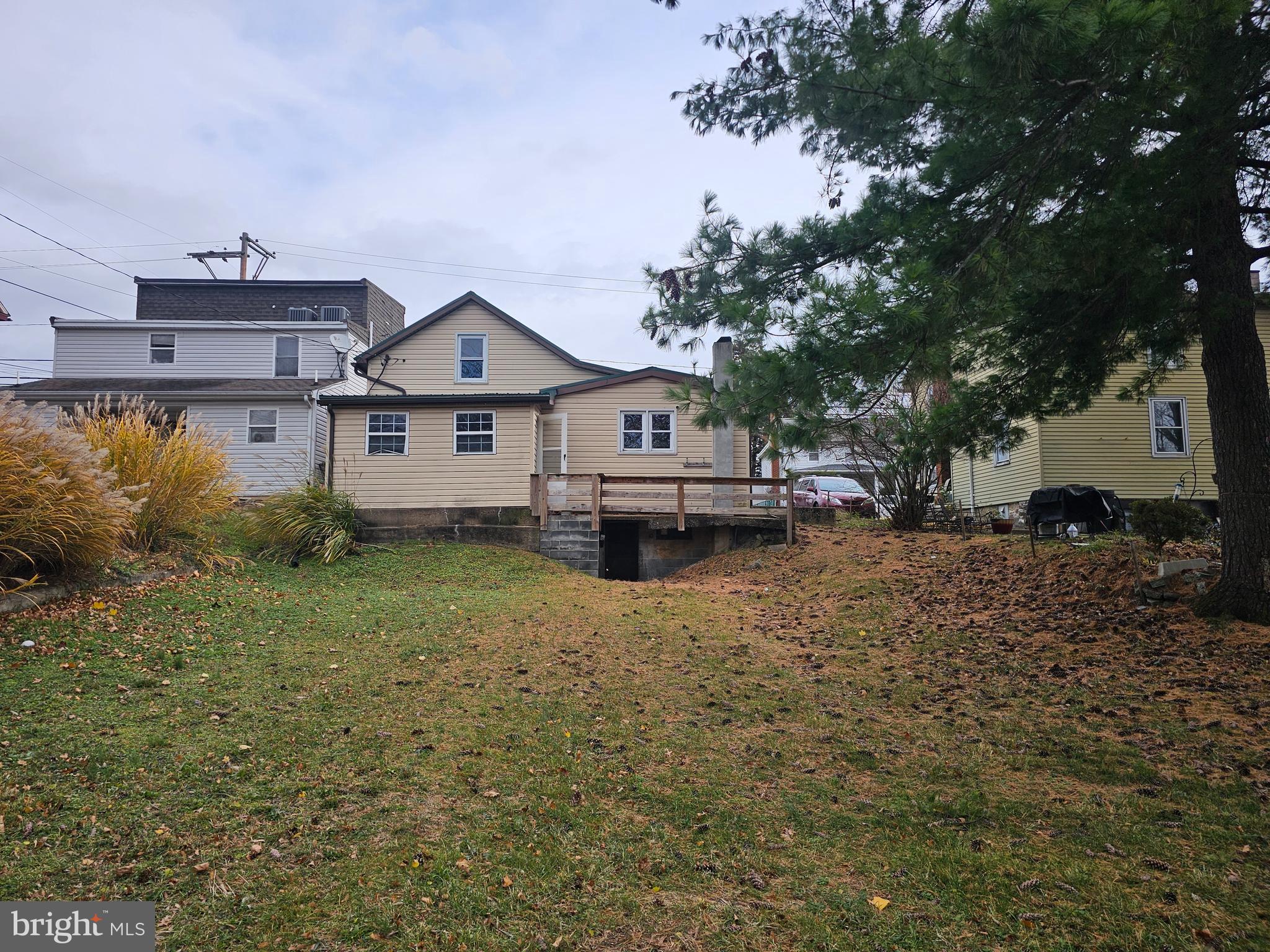 1261 Main Street Harrisburg, PA 17113 - Photo 10 of 10 a front view of a house with a garden and yard