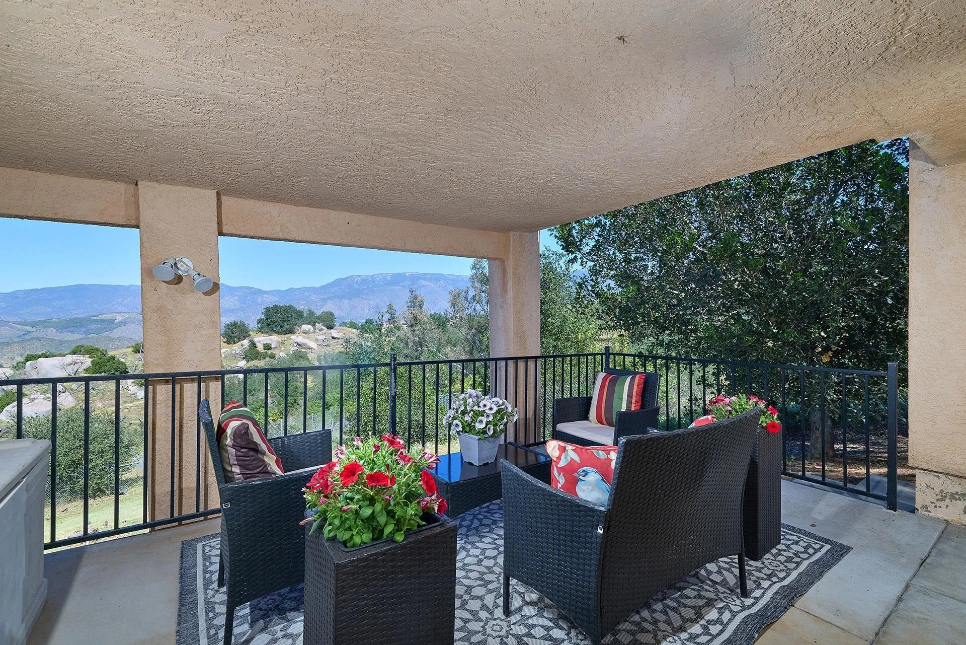 13588 McNally Road Valley Center, CA 92082 - Photo 19 of 43 a outdoor living with furniture and garden view