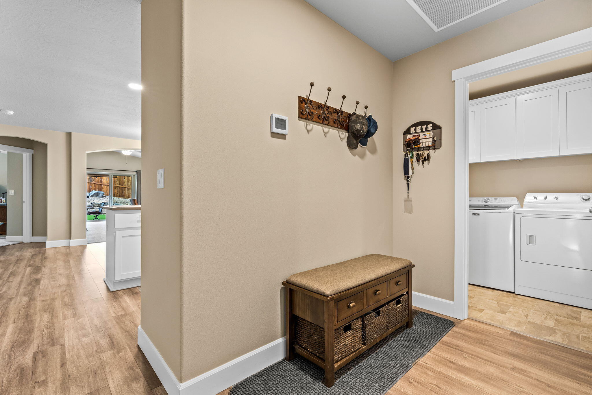 2546 Southwest Newberry Loop Redmond, OR 97756 - Photo 19 of 35 Laundry Room with Cabinets. Top Load Washer and Dryer included.