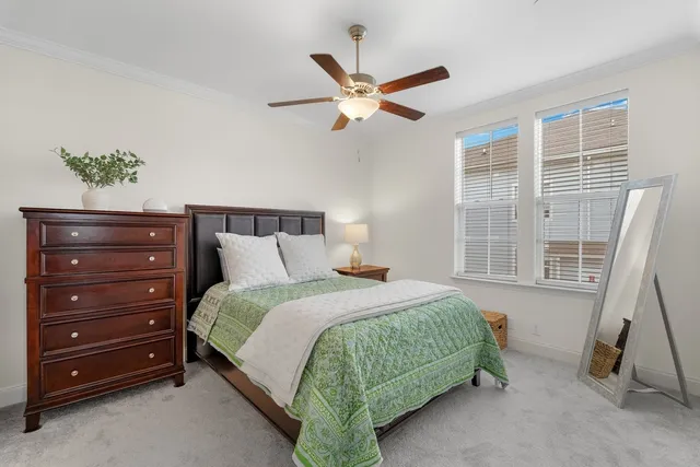 a bathroom with a sink vanity granite tub and shower