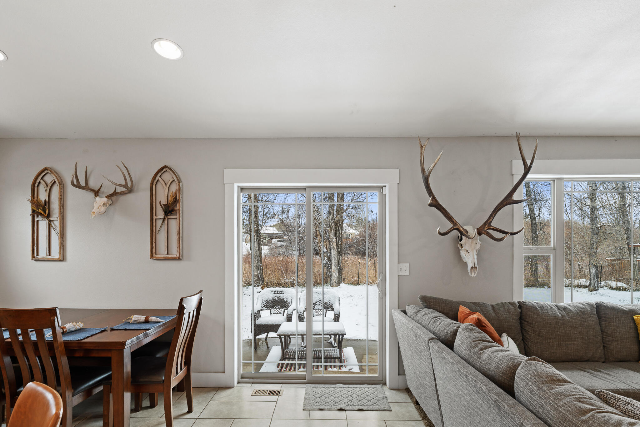 612 Heather Lane Ranchester, WY 82839 - Photo 23 of 45 Dining, Living and Back Doors