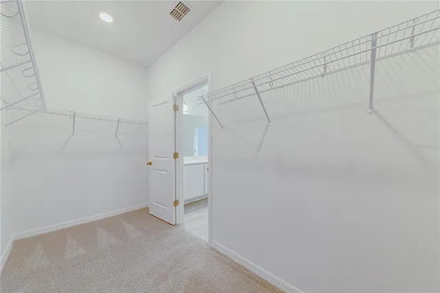 a view of a room with racks on the wall