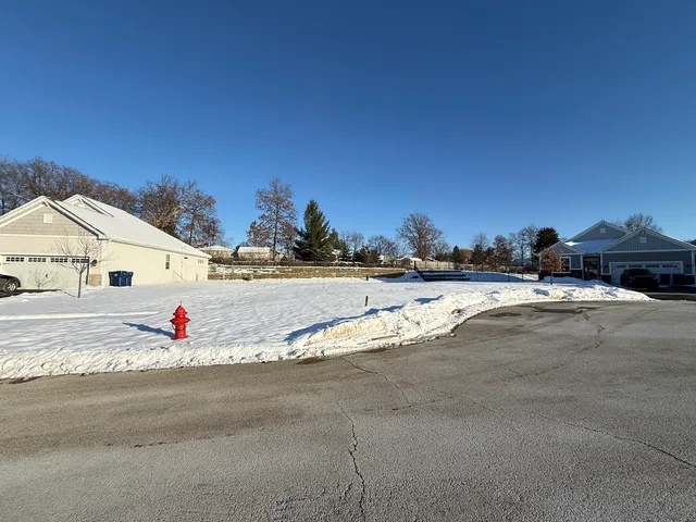 a view of multiple houses with a city street