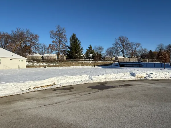a view of a road with an ocean view