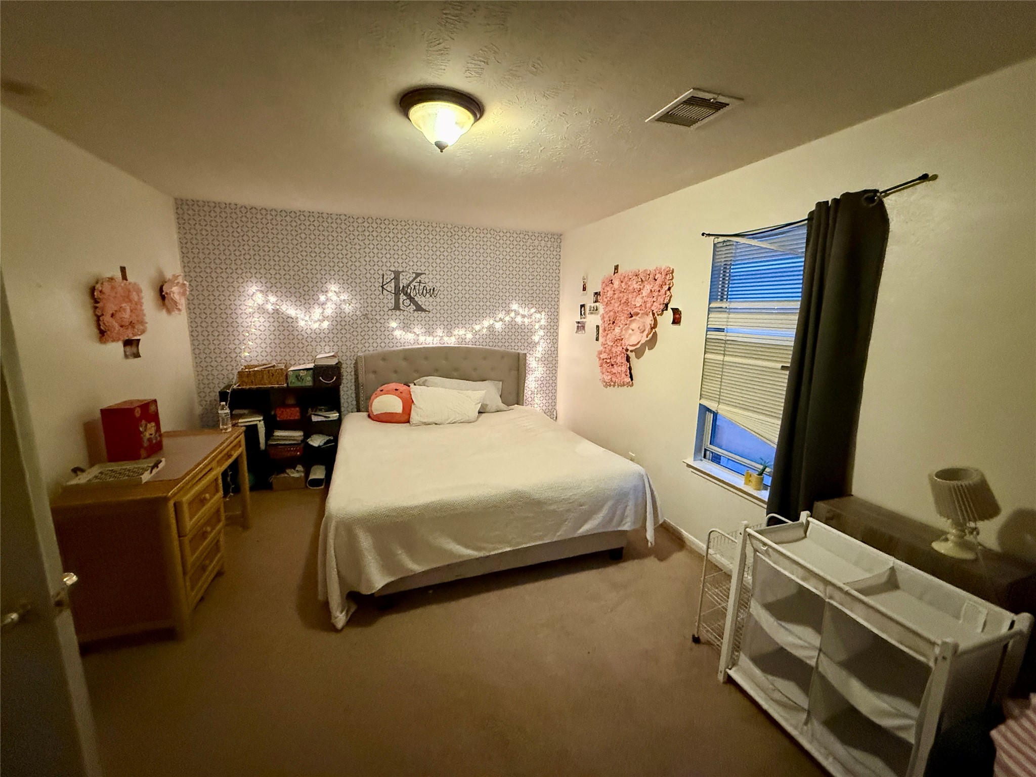 1022 Sycamore Ridge Lane Houston, TX 77073 - Photo 32 of 39 a bedroom with furniture and a flat screen tv