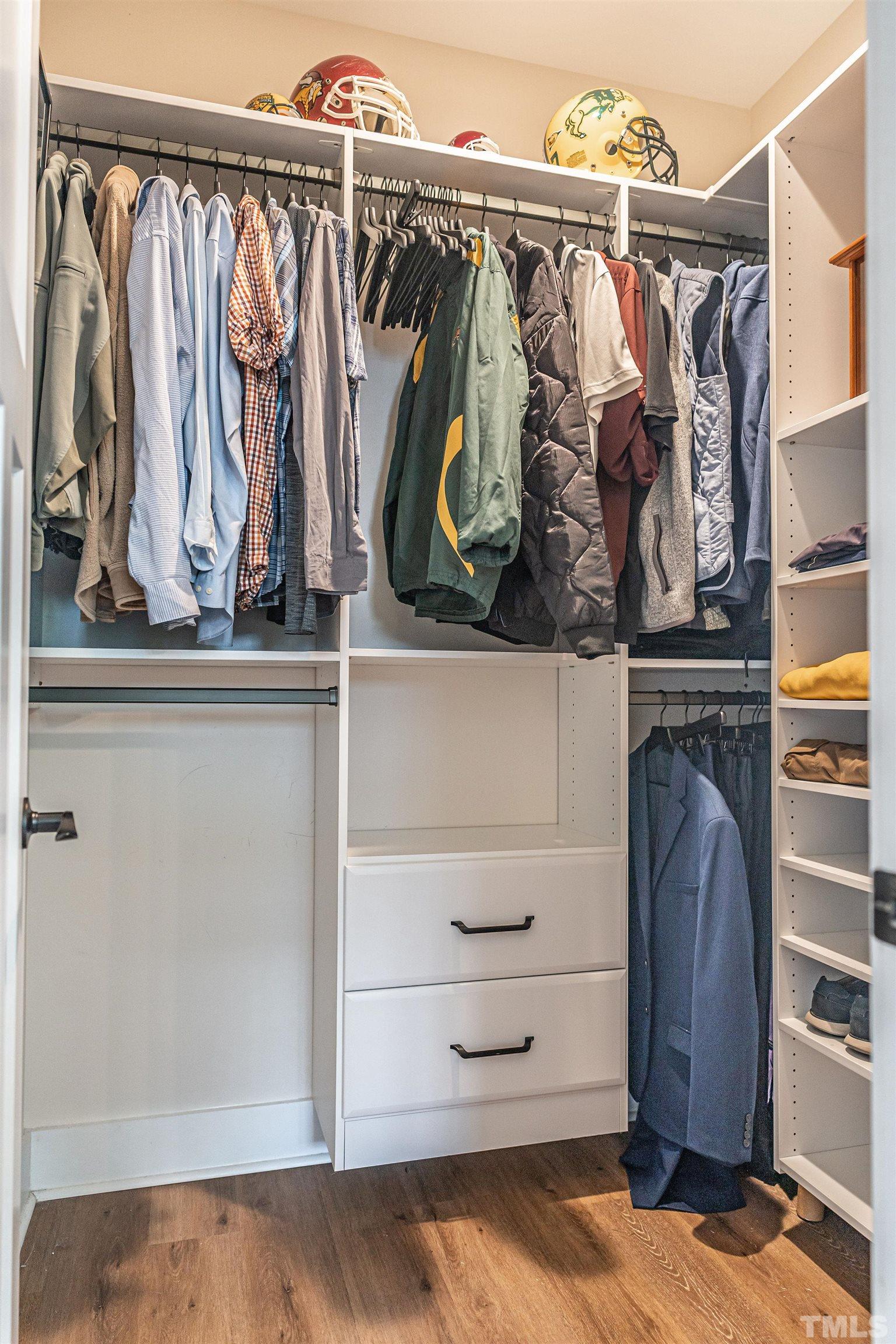 380 Sheldon Road Southern Pines, NC 28387 - Photo 16 of 32 a view of walk in closet with clothes and shoes