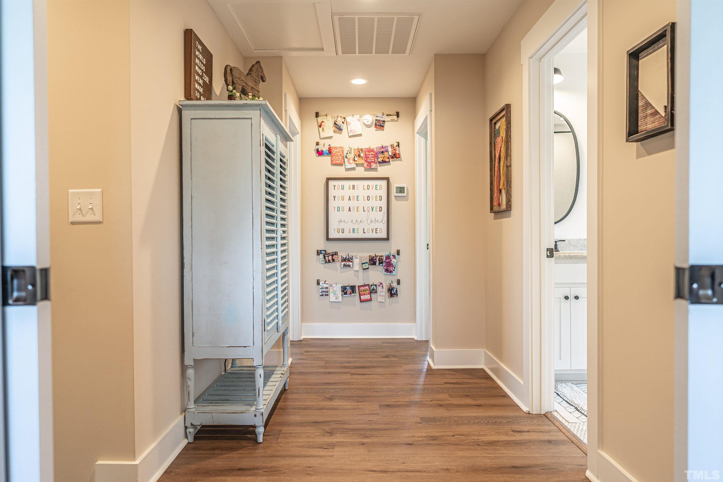 380 Sheldon Road Southern Pines, NC 28387 - Photo 20 of 32 a view of a hallway with wooden floor and windows