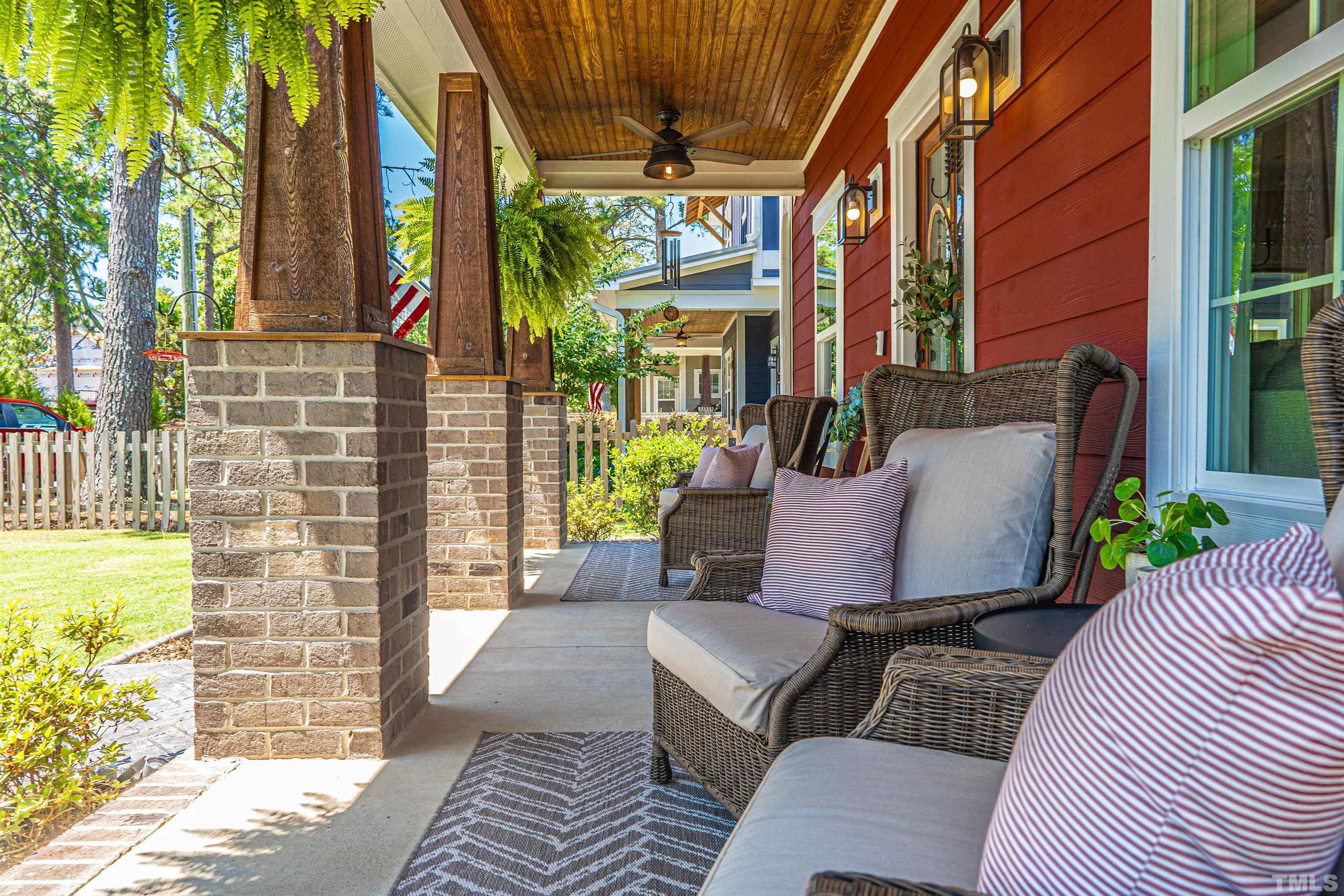 380 Sheldon Road Southern Pines, NC 28387 - Photo 2 of 32 a view of a patio with couches and potted plants