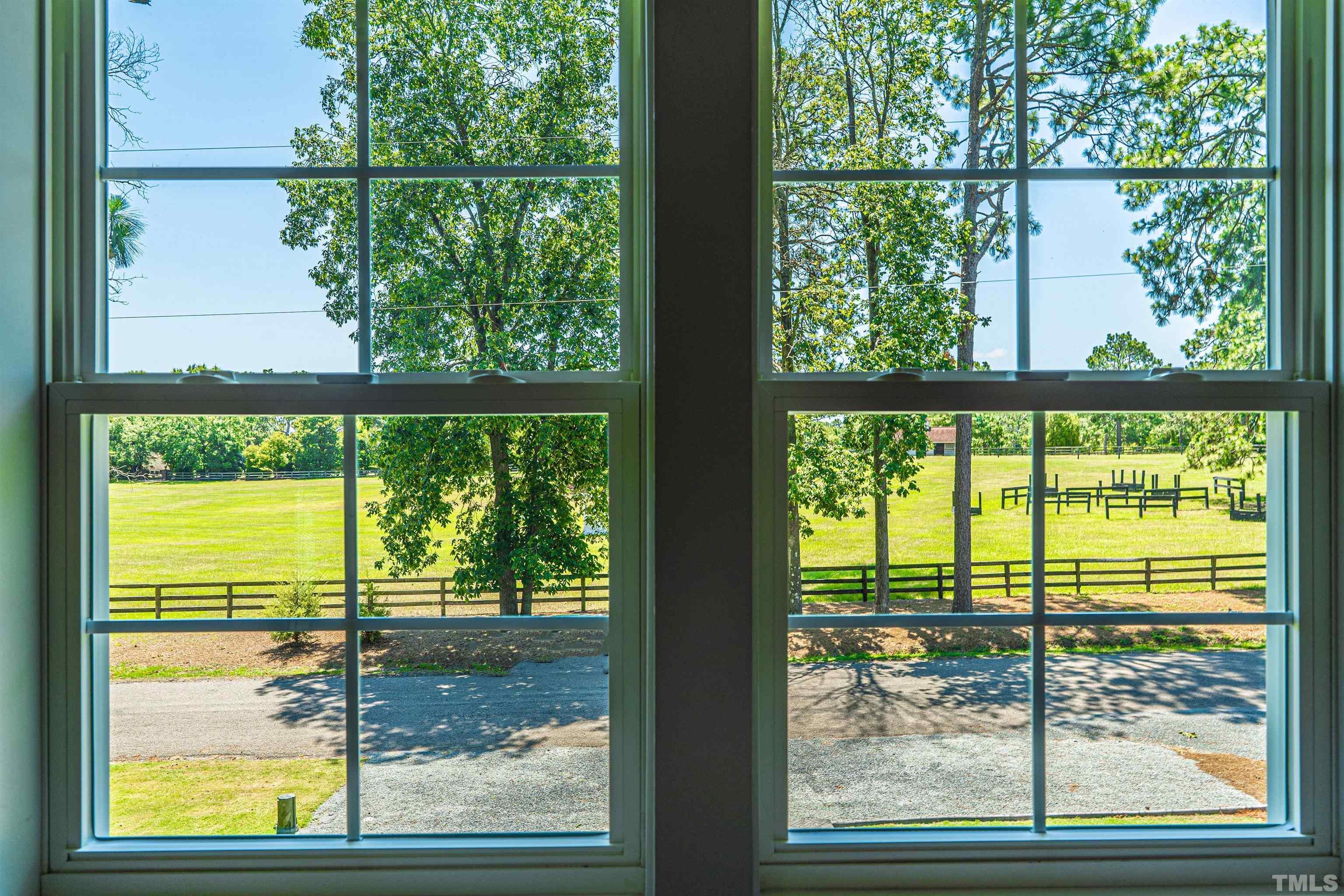 380 Sheldon Road Southern Pines, NC 28387 - Photo 22 of 32 a view of a room with large windows