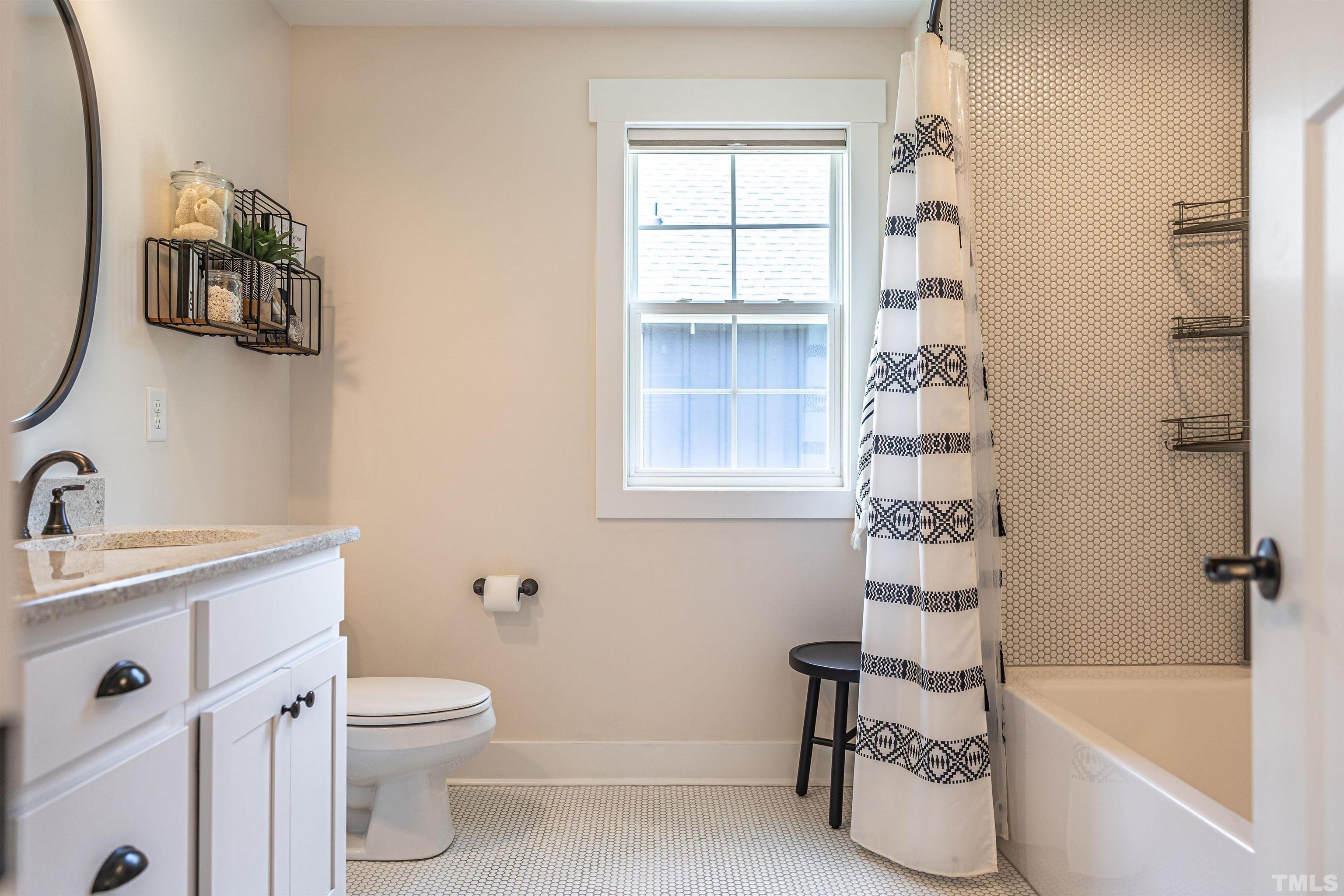 380 Sheldon Road Southern Pines, NC 28387 - Photo 23 of 32 a bathroom with a sink toilet and bathtub