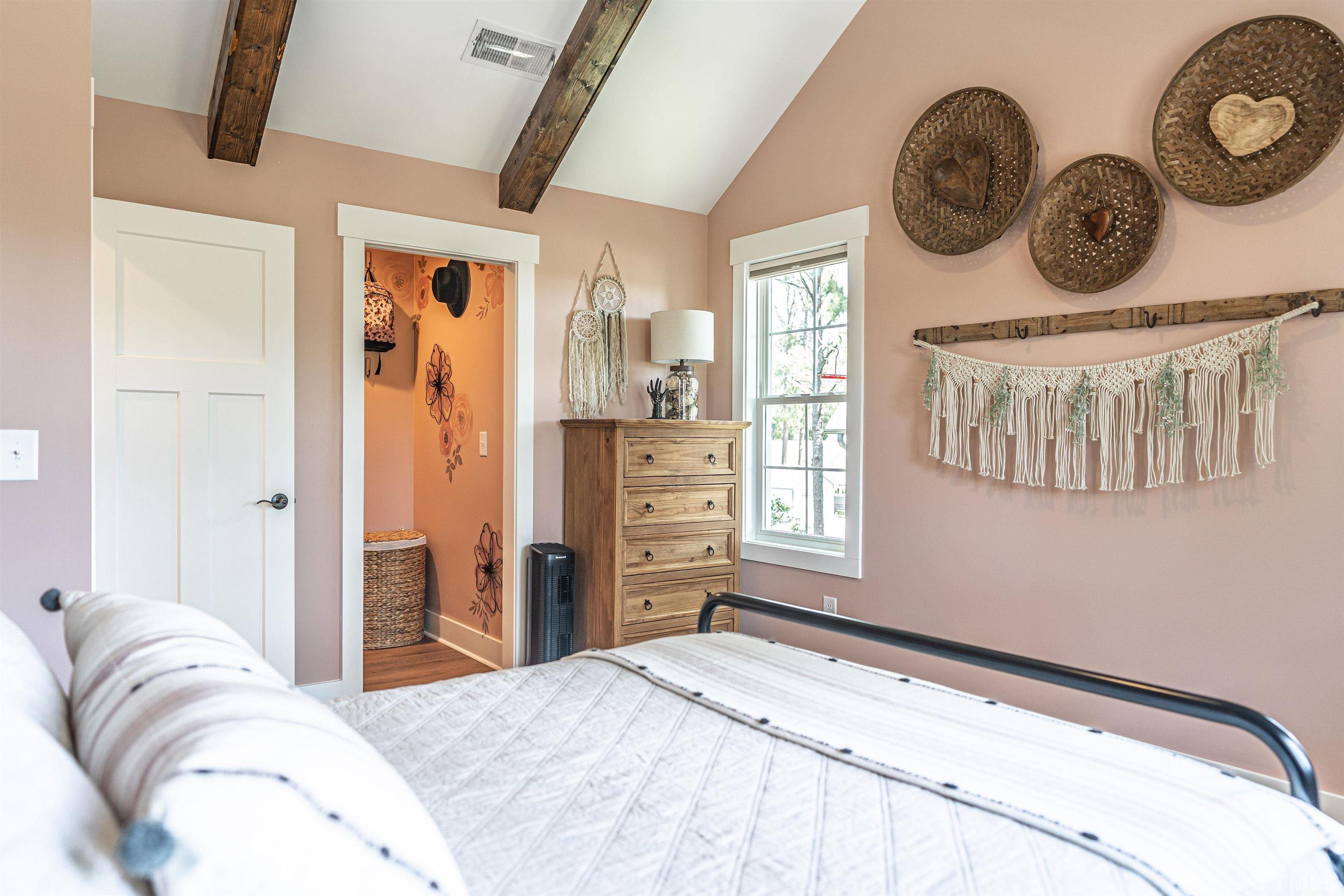 380 Sheldon Road Southern Pines, NC 28387 - Photo 25 of 32 a bedroom with a bed and a closet