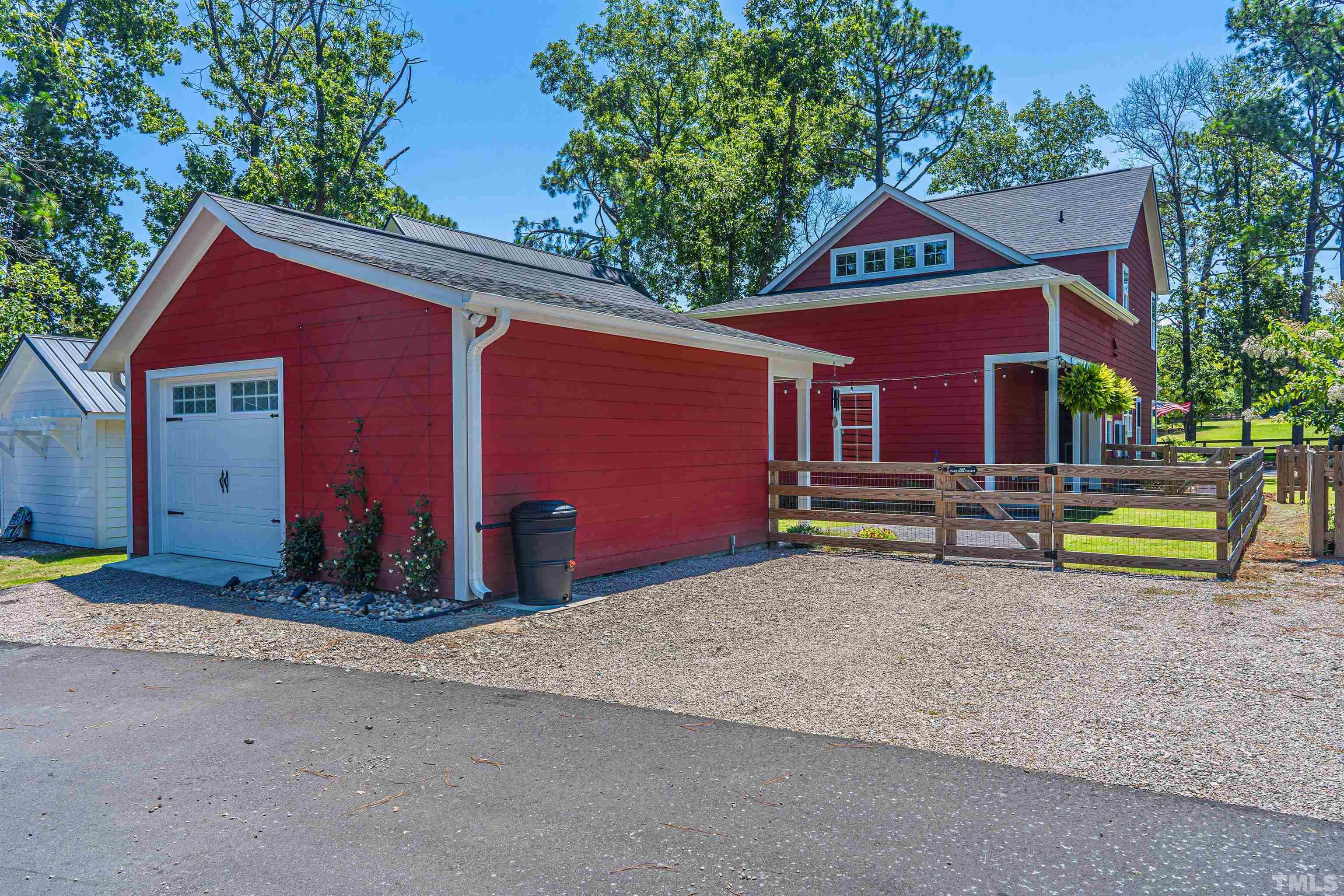 380 Sheldon Road Southern Pines, NC 28387 - Photo 29 of 32 a house view with a backyard