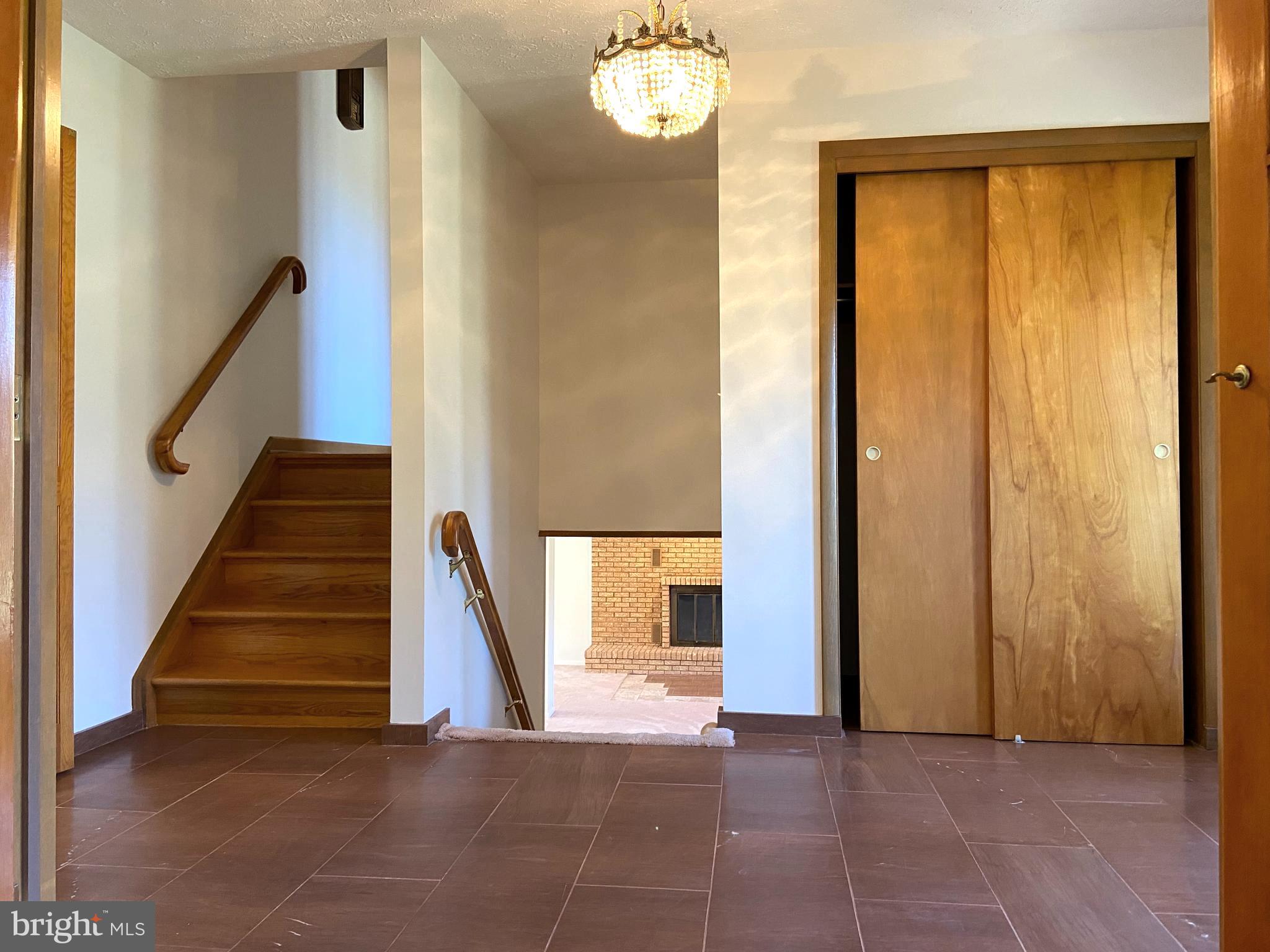 2128 Bellvale Road Fallston, MD 21047 - Photo 4 of 35 a view of entryway with wooden floor and stairs